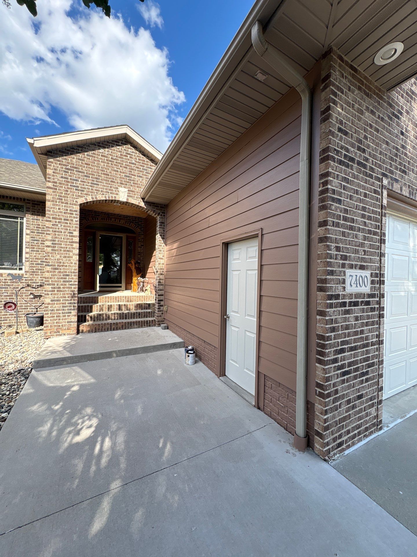 Exterior Painting and Wooden Deck Staining in Sioux Falls by Select Painting, Coatings & Garage Cabinets