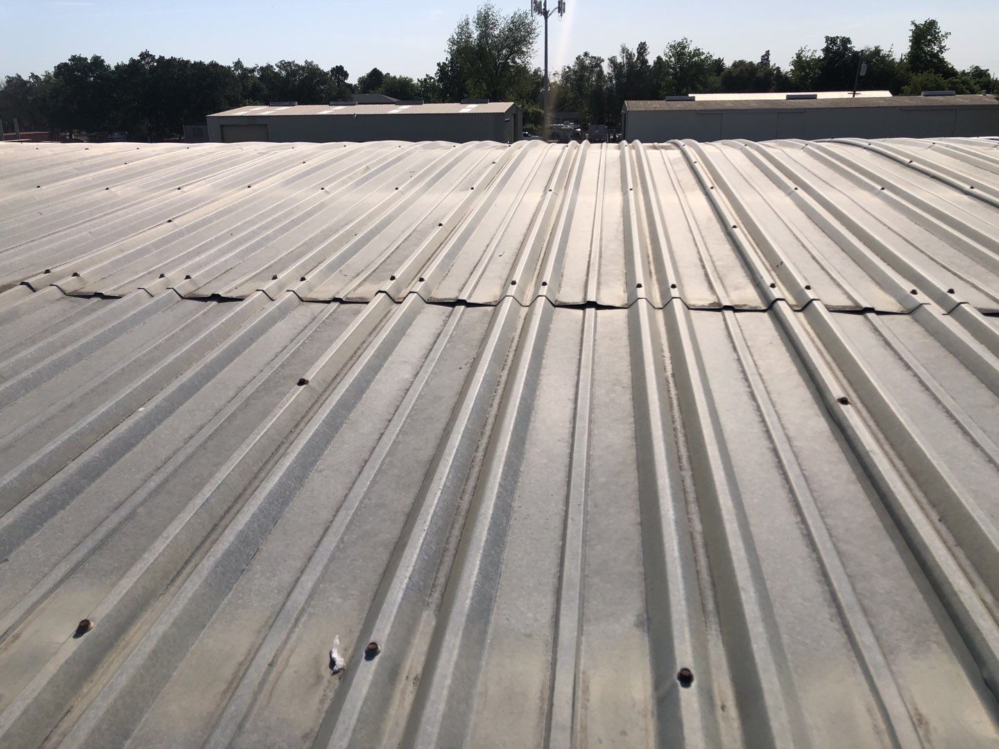 Spray foam and coatings using Conklin Benchmark/PUMA XL coatings and spray foam by Straight Edge Roofing Inc