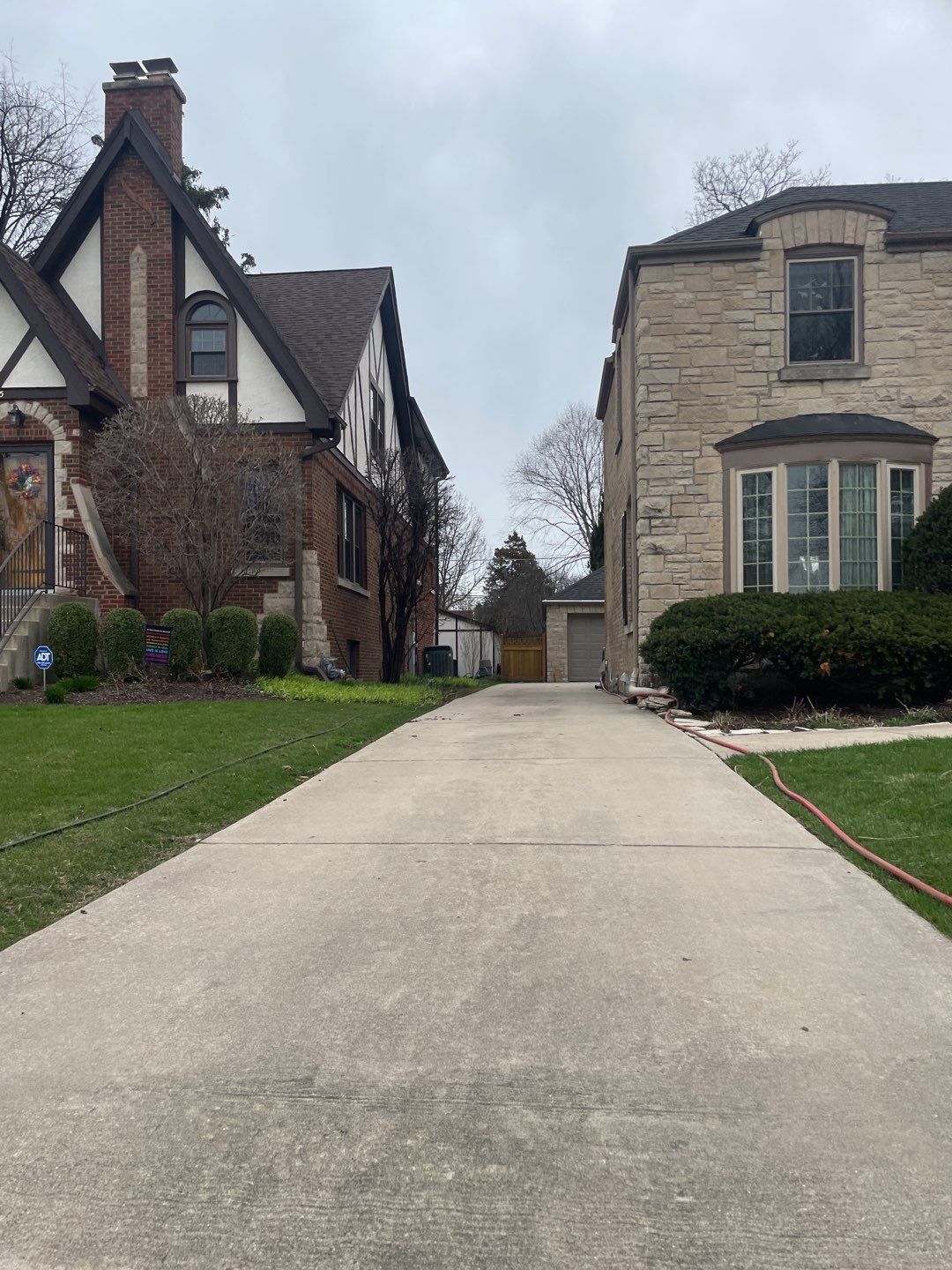 Wood cleaning and staining using Armstrong cloark oil stain by Northern Power Washing LLC.