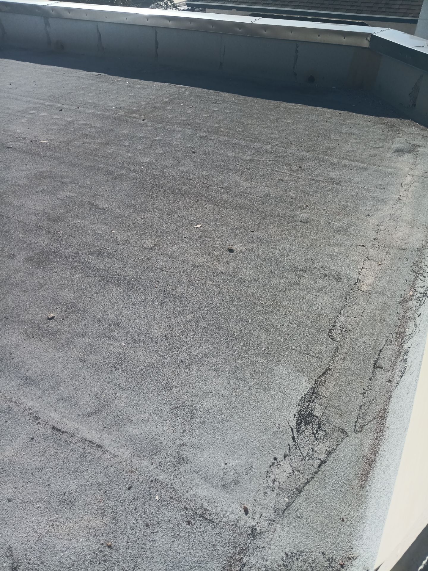Off with the Tile and on with the TILCOR stone coated metal.  by Bayfront Roofing and Construction