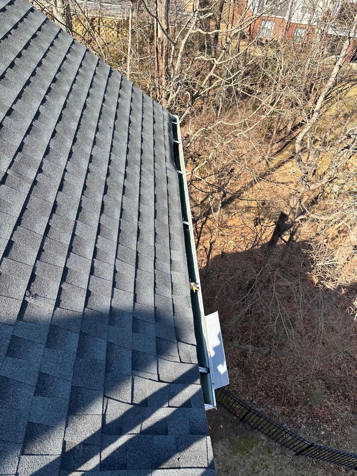 HOA gutter cleaning in Rock Hill, SC,after  photo showing full gutters.