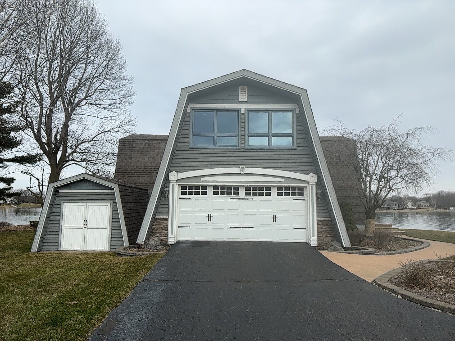 Metal Slate Shingle Roof in Sturgis, Michigan – “Darth Vader Helmet” Home by 4Ever Metal Roofing