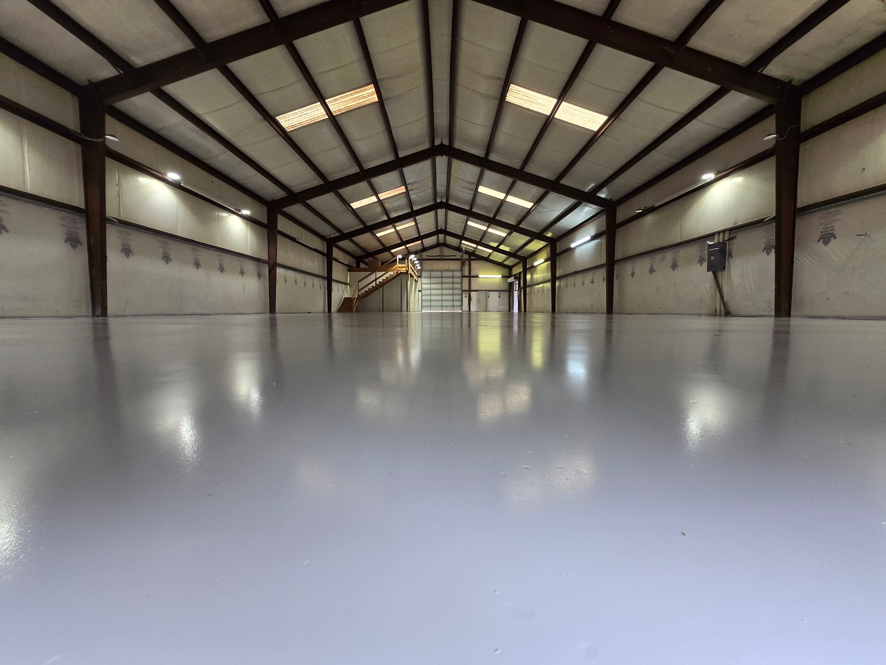 Shop Floor Transformation Using Industrial-Grade Epoxy Urethane by Elite Floor Solutions