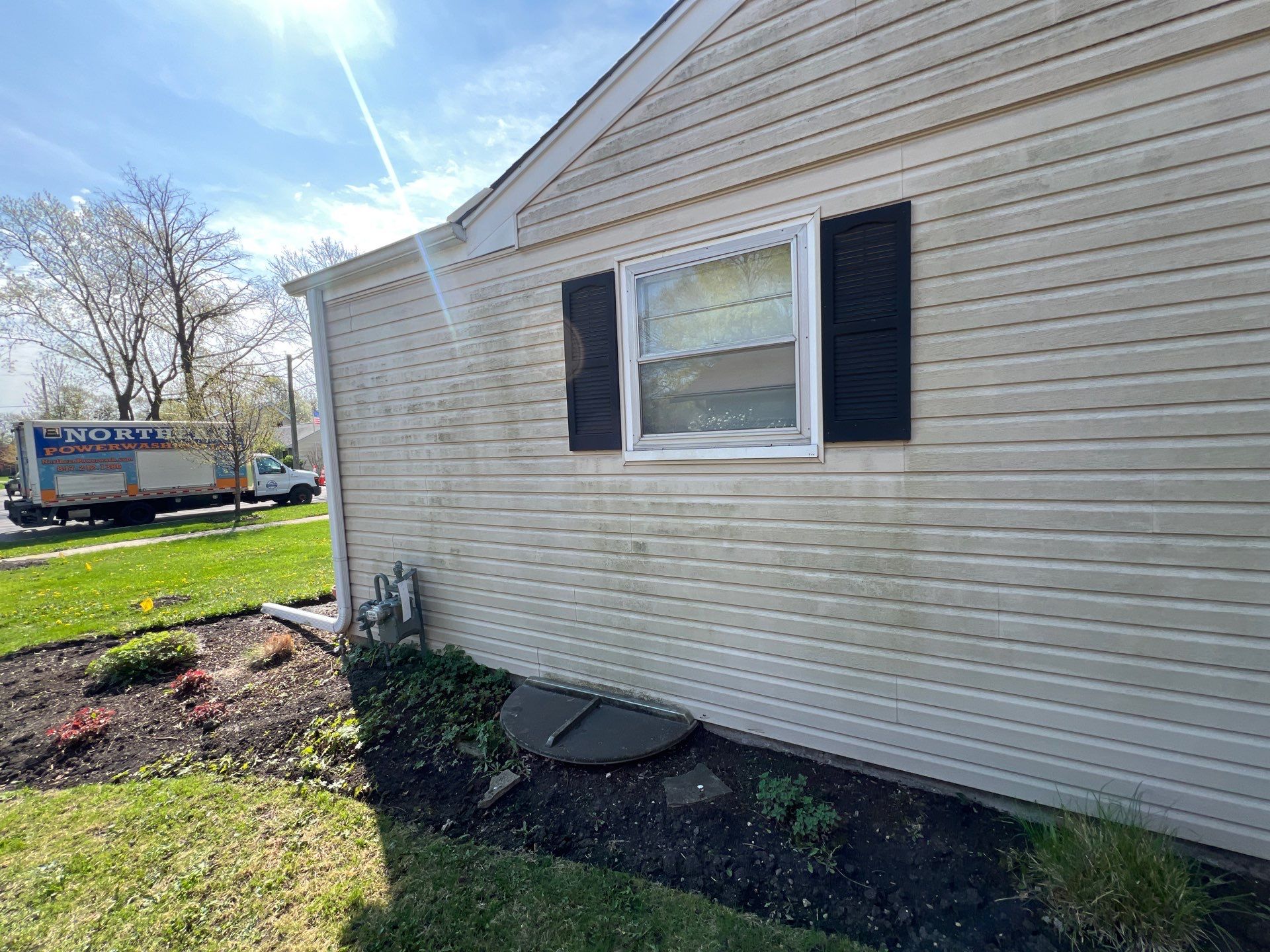 Housewashing  using Algaecide, soft wash soap by Northern Power Washing LLC.