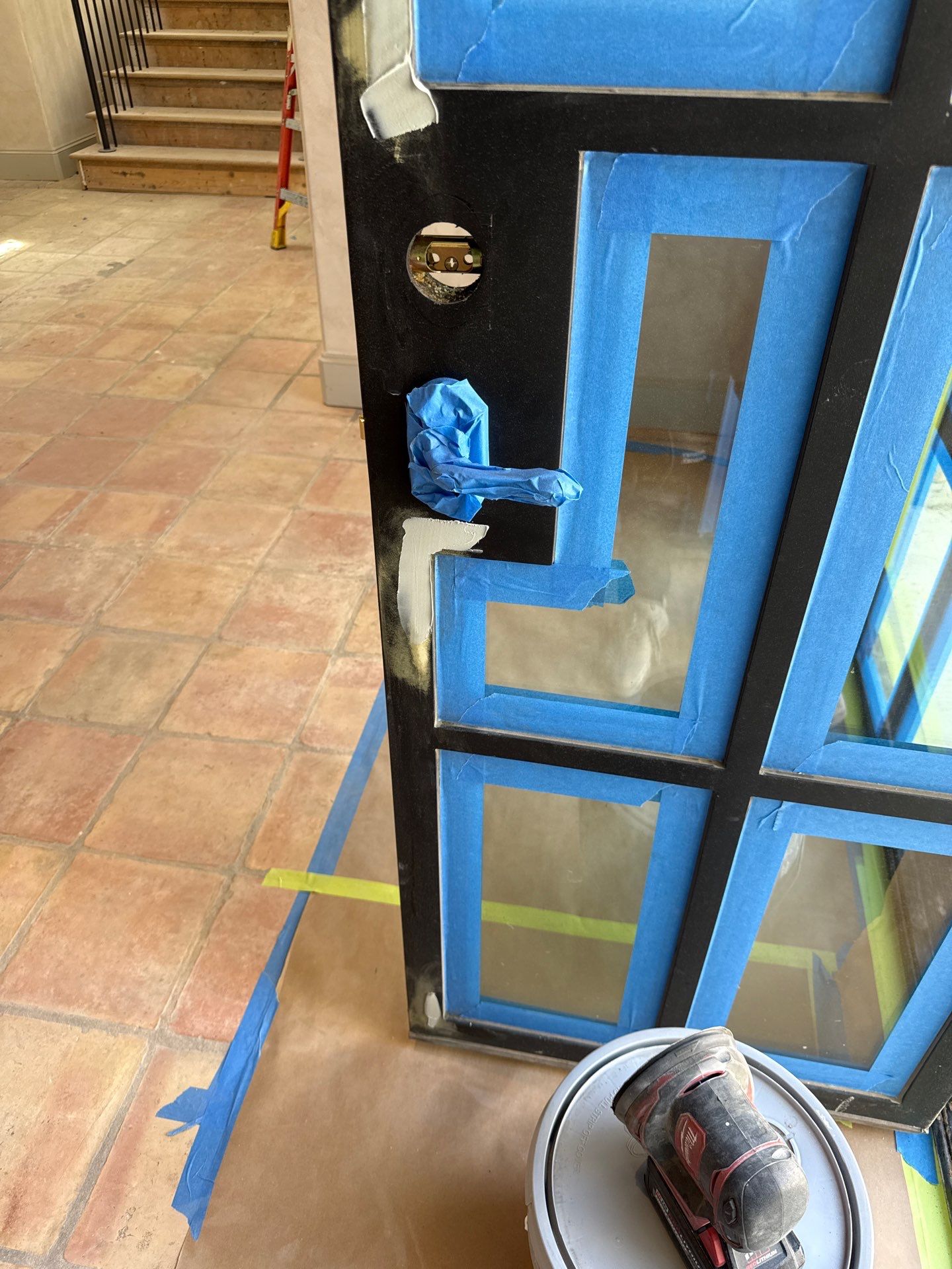 Arched Black Metal French Door Installation and Finishing in Fort Worth by Solara Custom Living