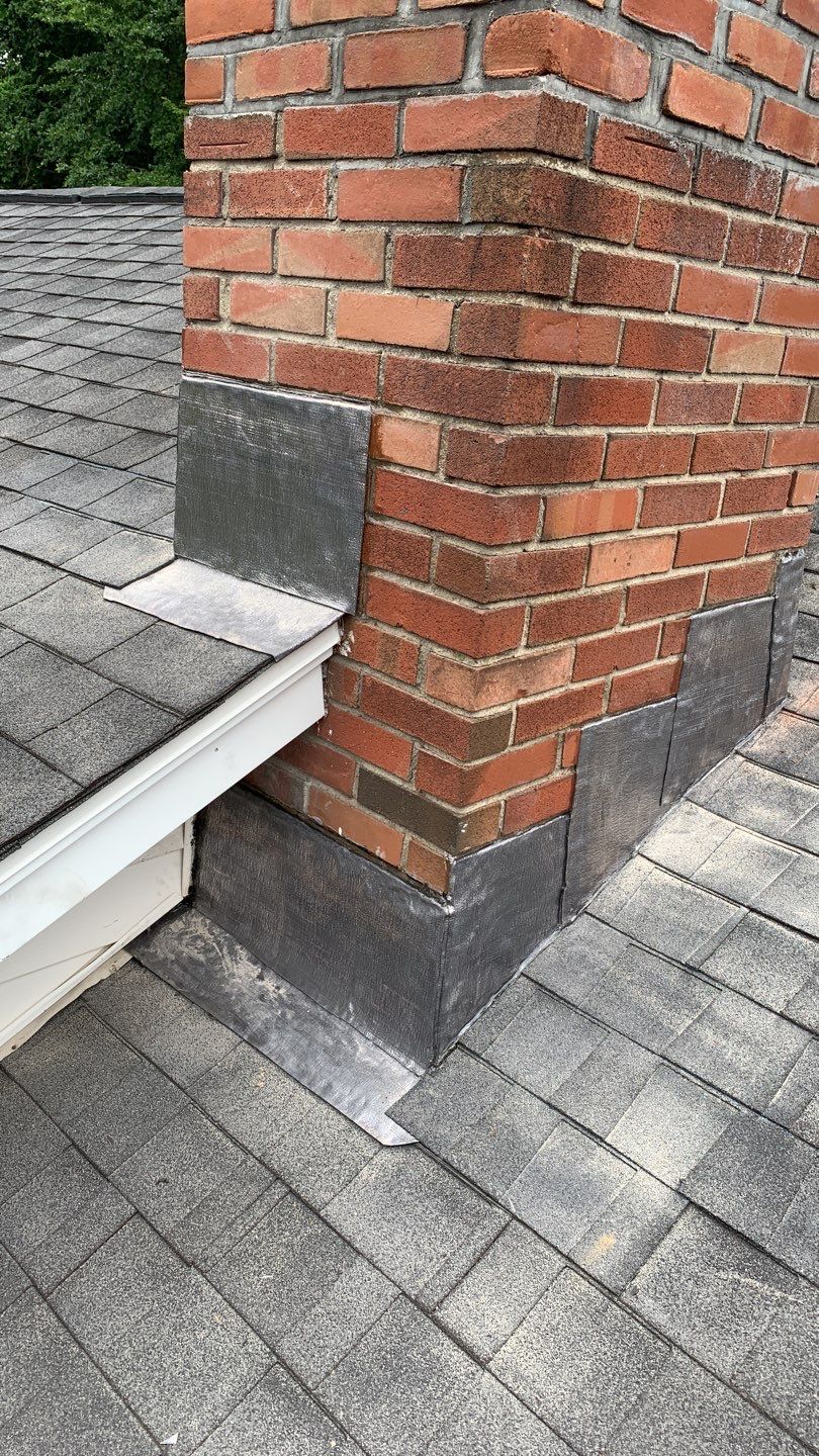 Residential Roofing Repair using Chimney Flashing by A Plus Exterior