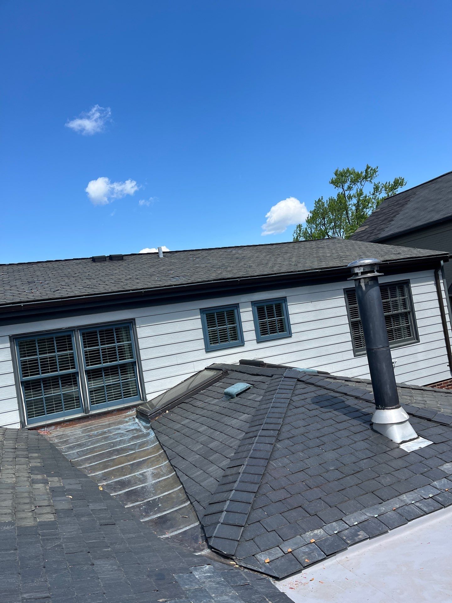 Arlington: Buckingham Slate and Carlisle Syntec TPO Roof by RM Banning, Inc.