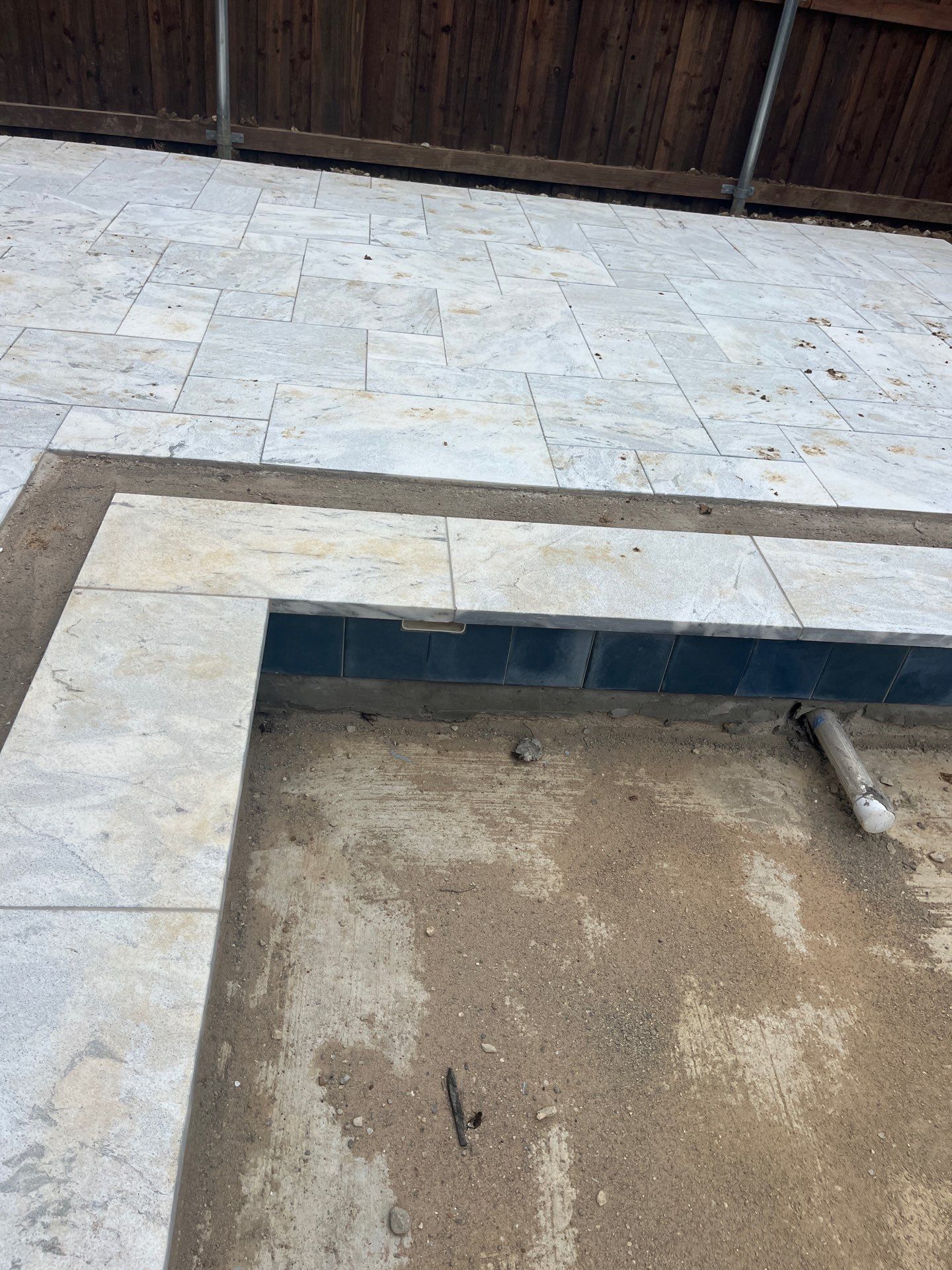 Geometric Pool with Raised Spa and Sheer Descent Waterfall by Pinnacle Pools and Spas - DFW