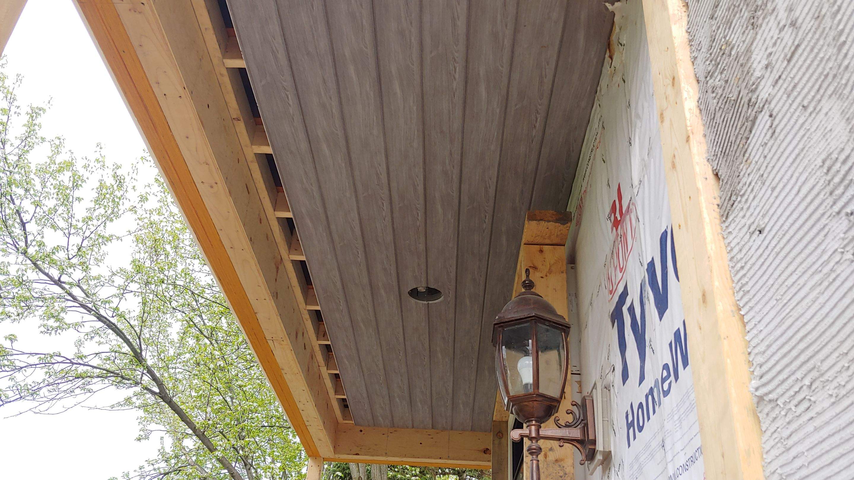 Exterior Renovations- Siding, Concrete, Railings, and Entry Door  by Ivy Lea Construction