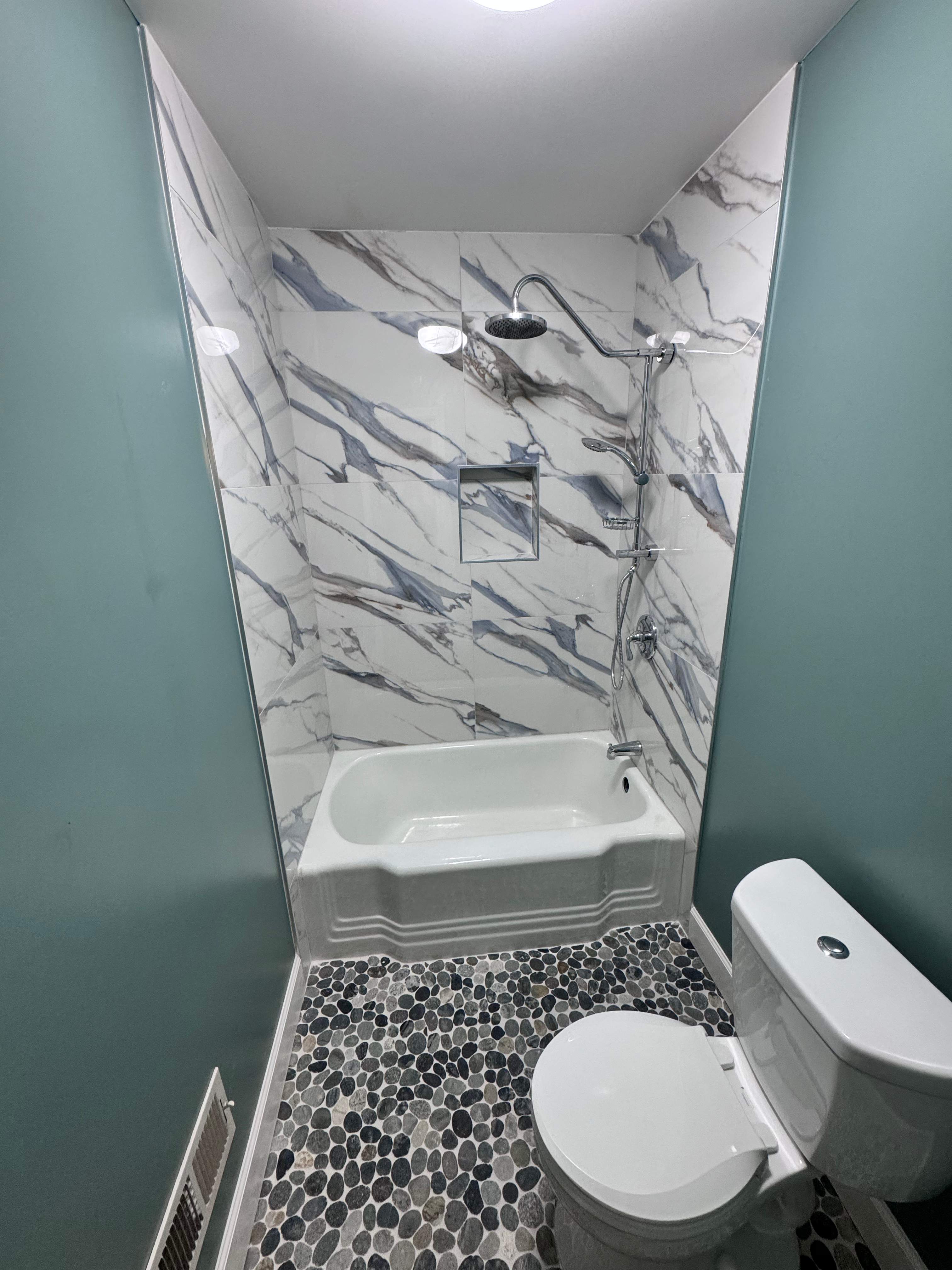 Guest bathroom renovation by Prudencio