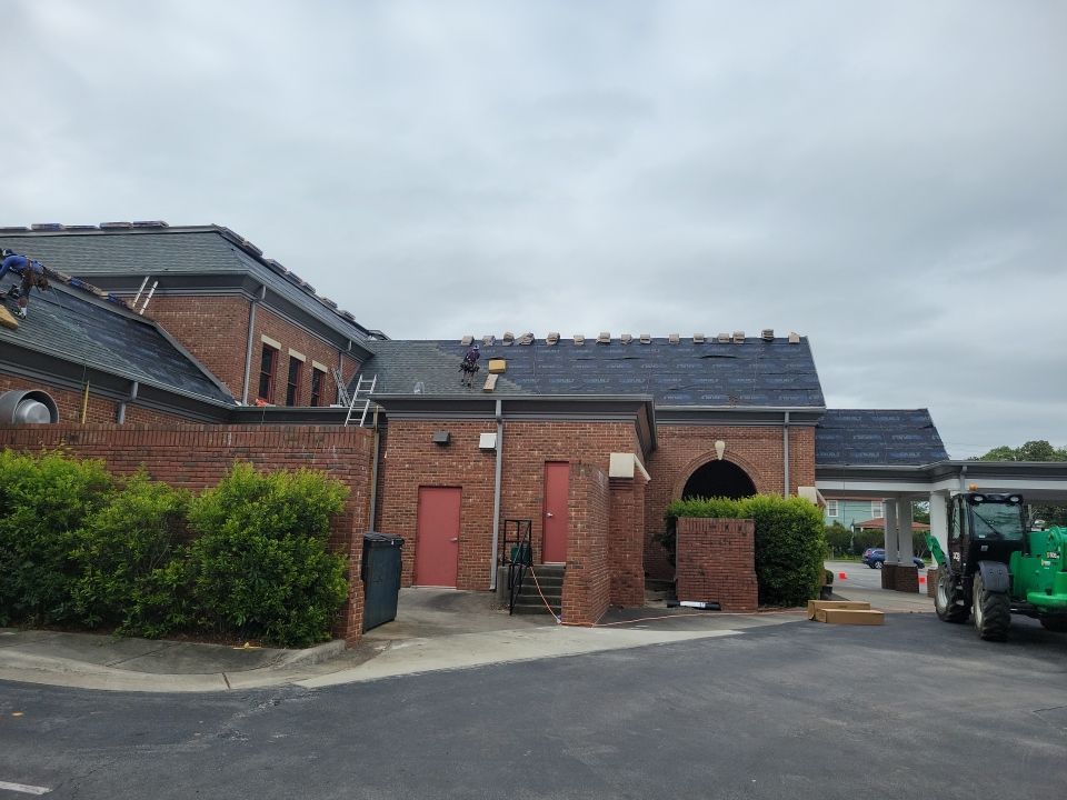 Commercial Roofing Installation using High Grade Asphalt Shingles by Carolina Trophy Roofs