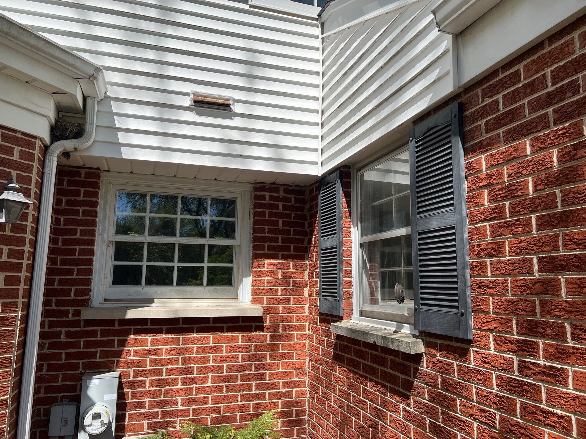 Housewashing  using Algaecide, soft wash soap by Northern Power Washing LLC.