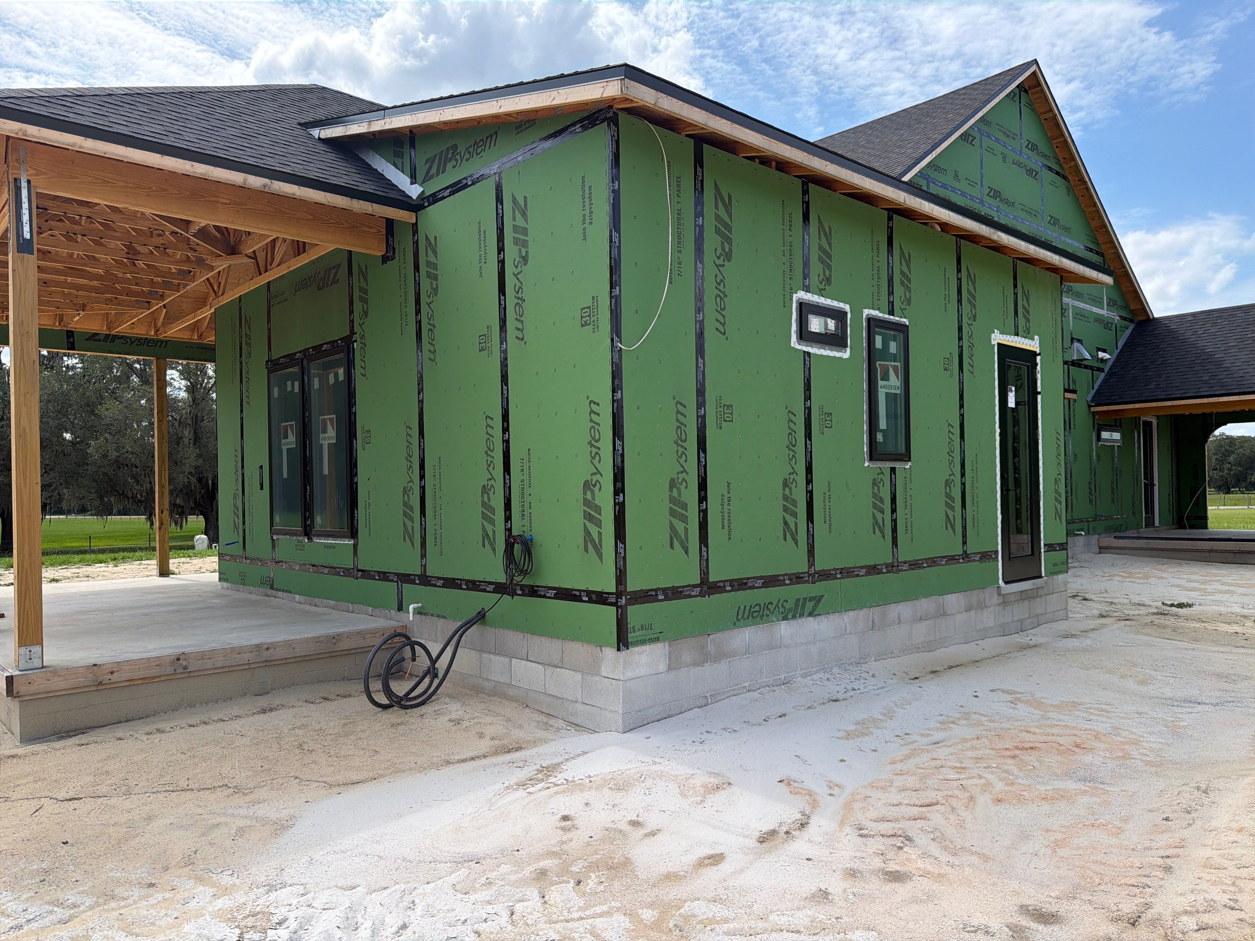 New Construction Andersen Fibrex Windows and Provia Doors in Melrose by Windows & Doors Store