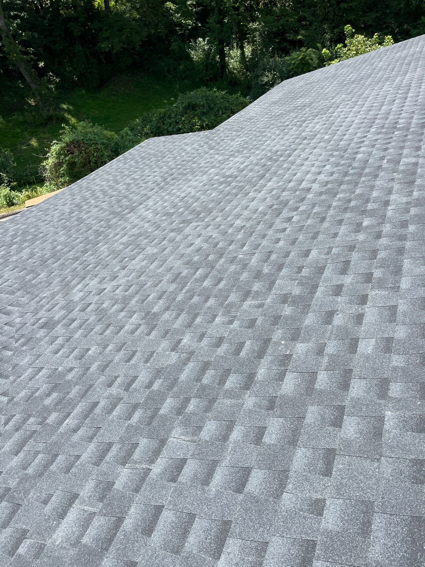Residential Roofing Installation using GAF Timberline HDZ Charcoal by Rainstoppers Roofing