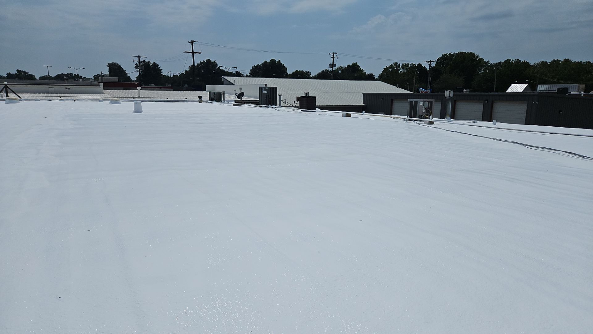 Commercial Roofing Install - SPF Foam & Coatings Restoration System - Color White  by Titan Commercial & Residential Roofing 