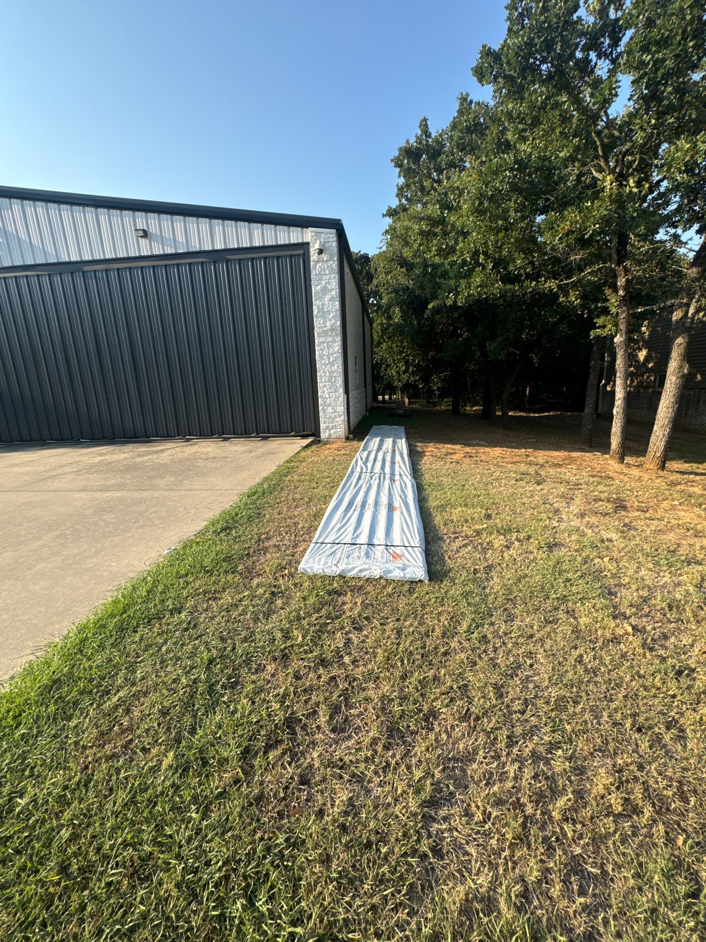 R-Panel Replacement by First Out Roofing 