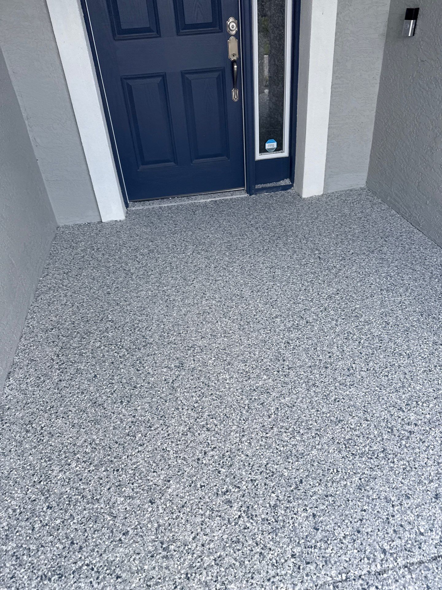 Driveway with Border Slatestone  by Innovative Concrete Coatings 