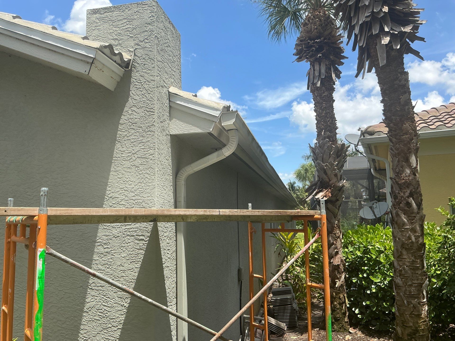 6 Inch Seamless Gutters and Downspout Installation in Naples FL by Gutter Professors