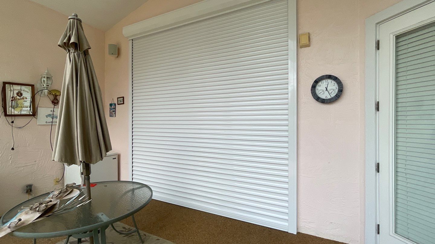 Rolling, Accordion and Bahama Shutters by Smart Guard Shutters