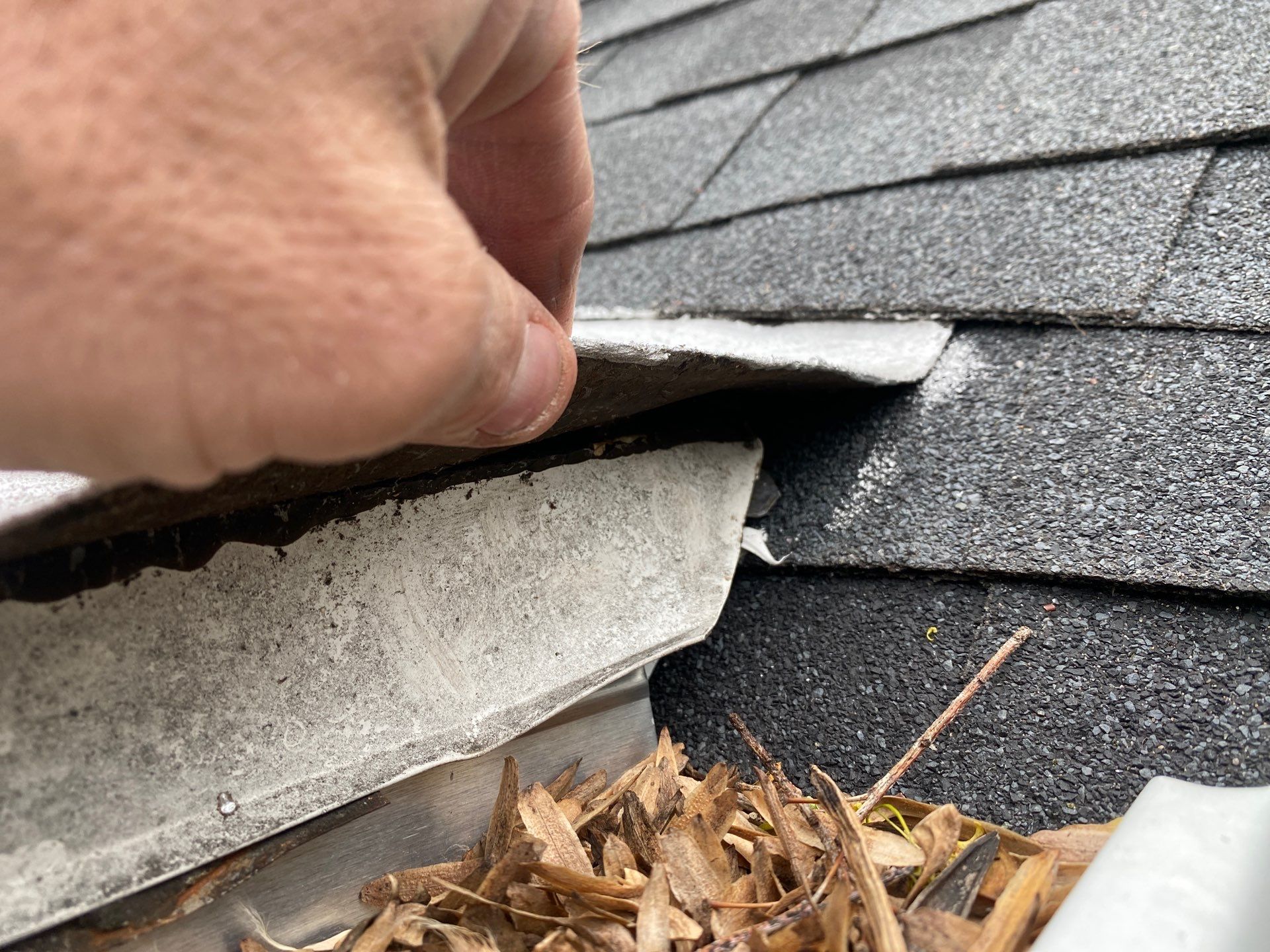 Asphalt Roof, Vinyl Siding, and Aluminum Gutter Replacement by Custom Installations