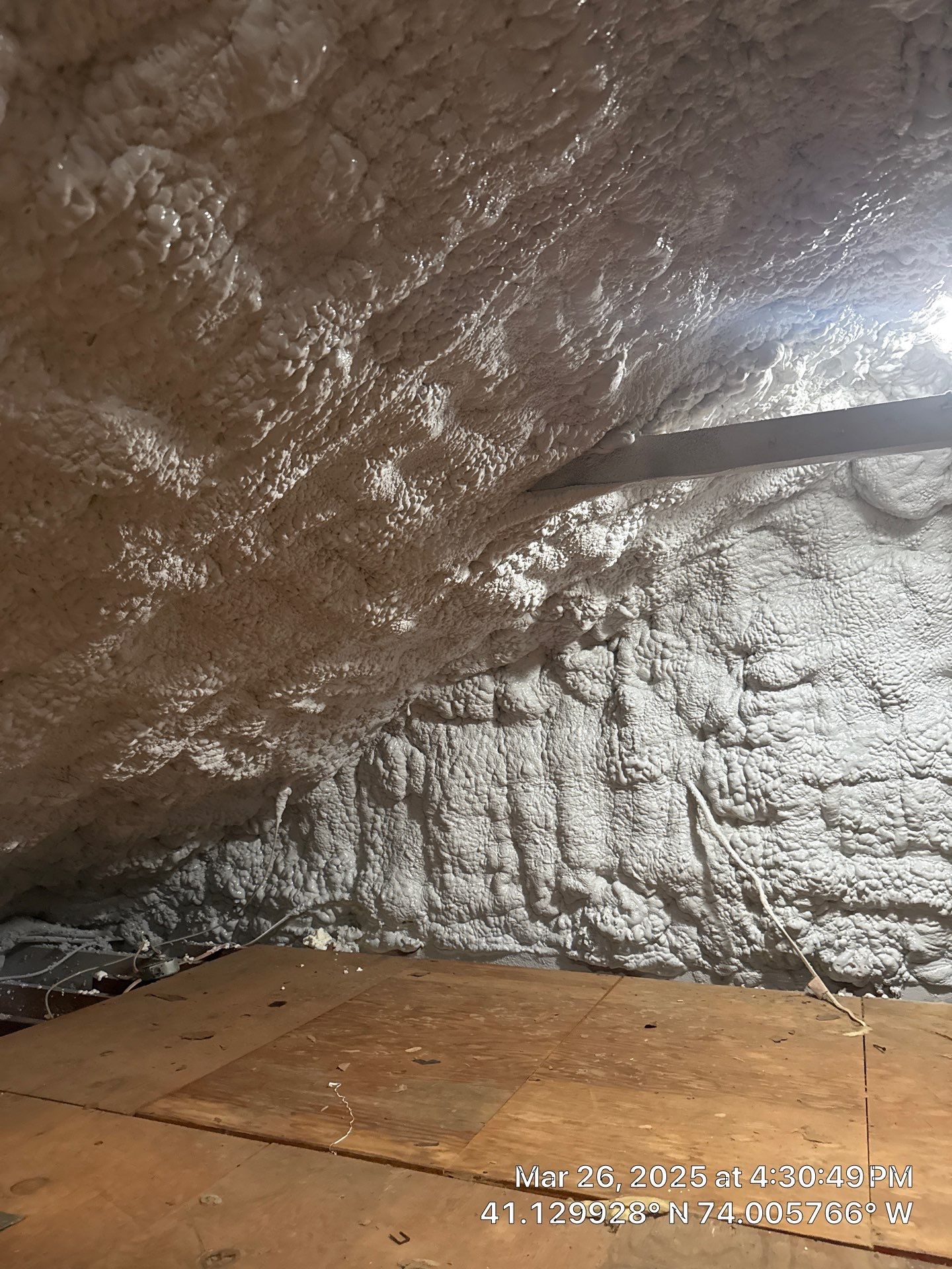 Attic Insulation using open cell spray foam and closed cell rim joist by NYS Foam & Energy