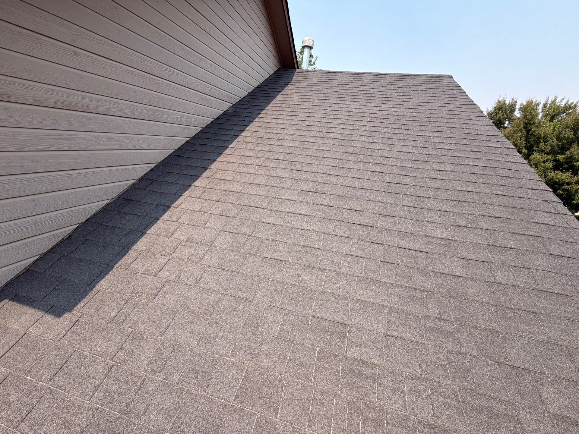 Residential Roof Replacement in Meridian Featuring Charcoal Architectural Shingles by Olive Roofing