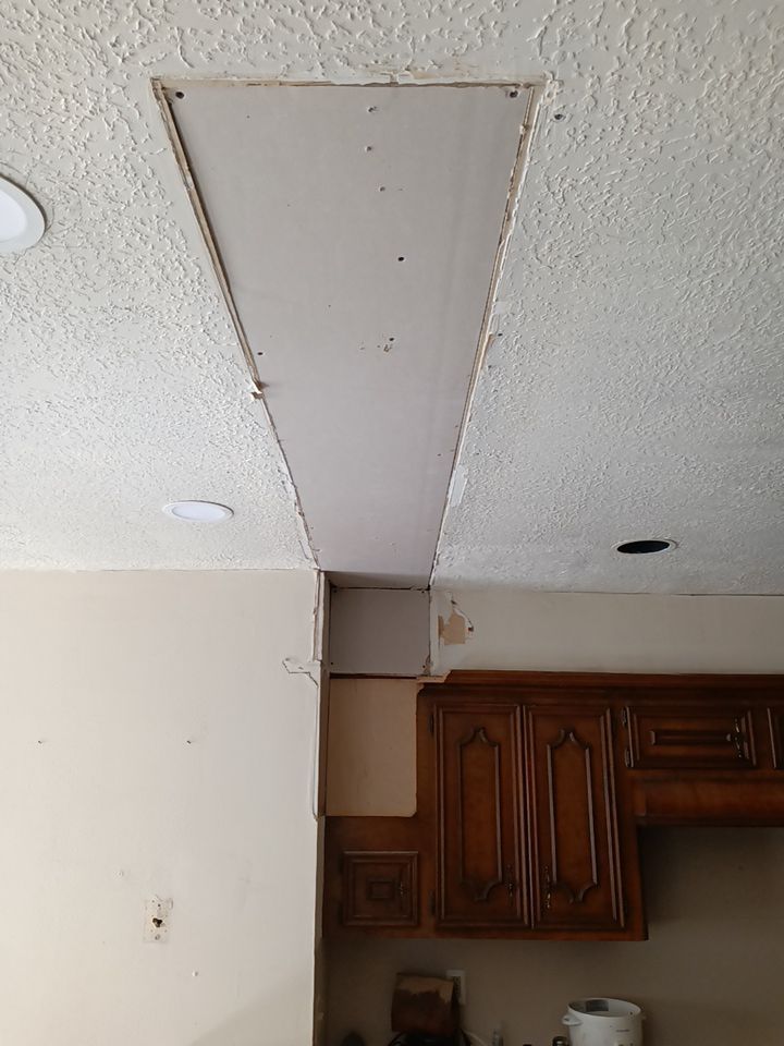 Interior and exterior painting project by Roof Concepts Construction