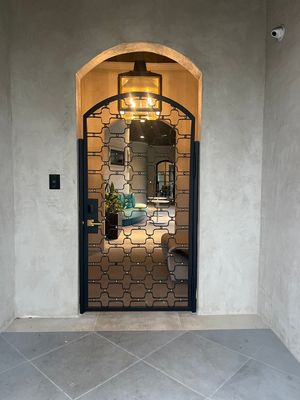 Arched Decorative Metal Security Gate Installation in Dallas