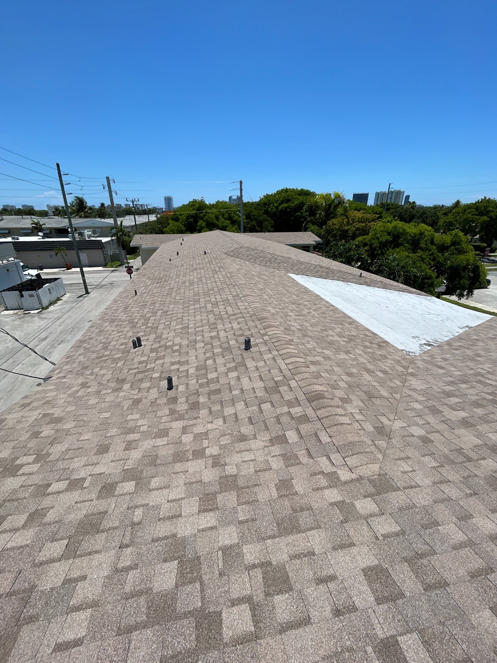 Commercial Roofing Installation using CERTAINTEED LANDMARK AR (SUNRISE CEDAR) by Earl W. Johnston Roofing 