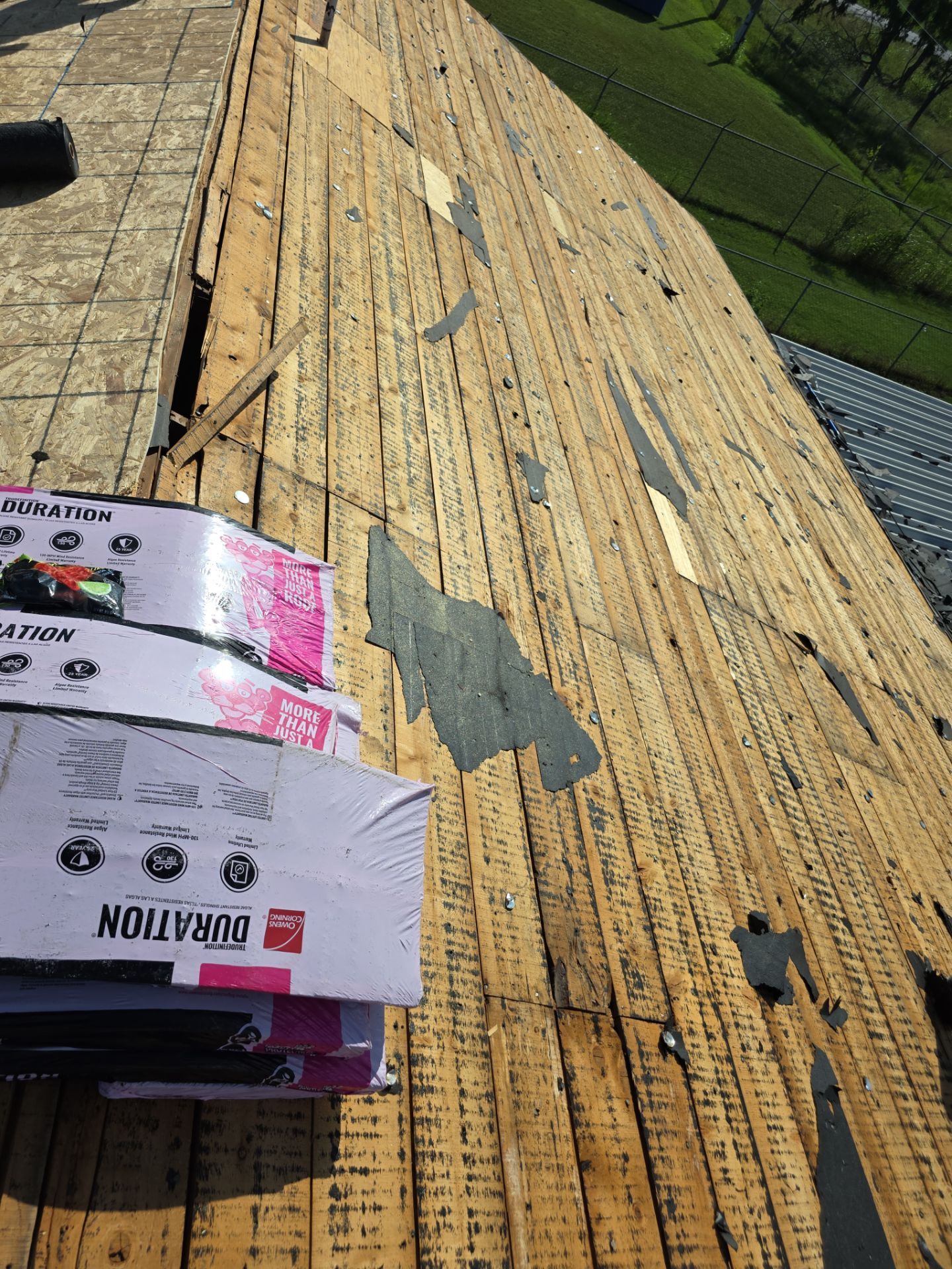 New roof & siding paid by insurance. Along with new roof sheathing.  by In & Out Construction & Remodeling, LLC