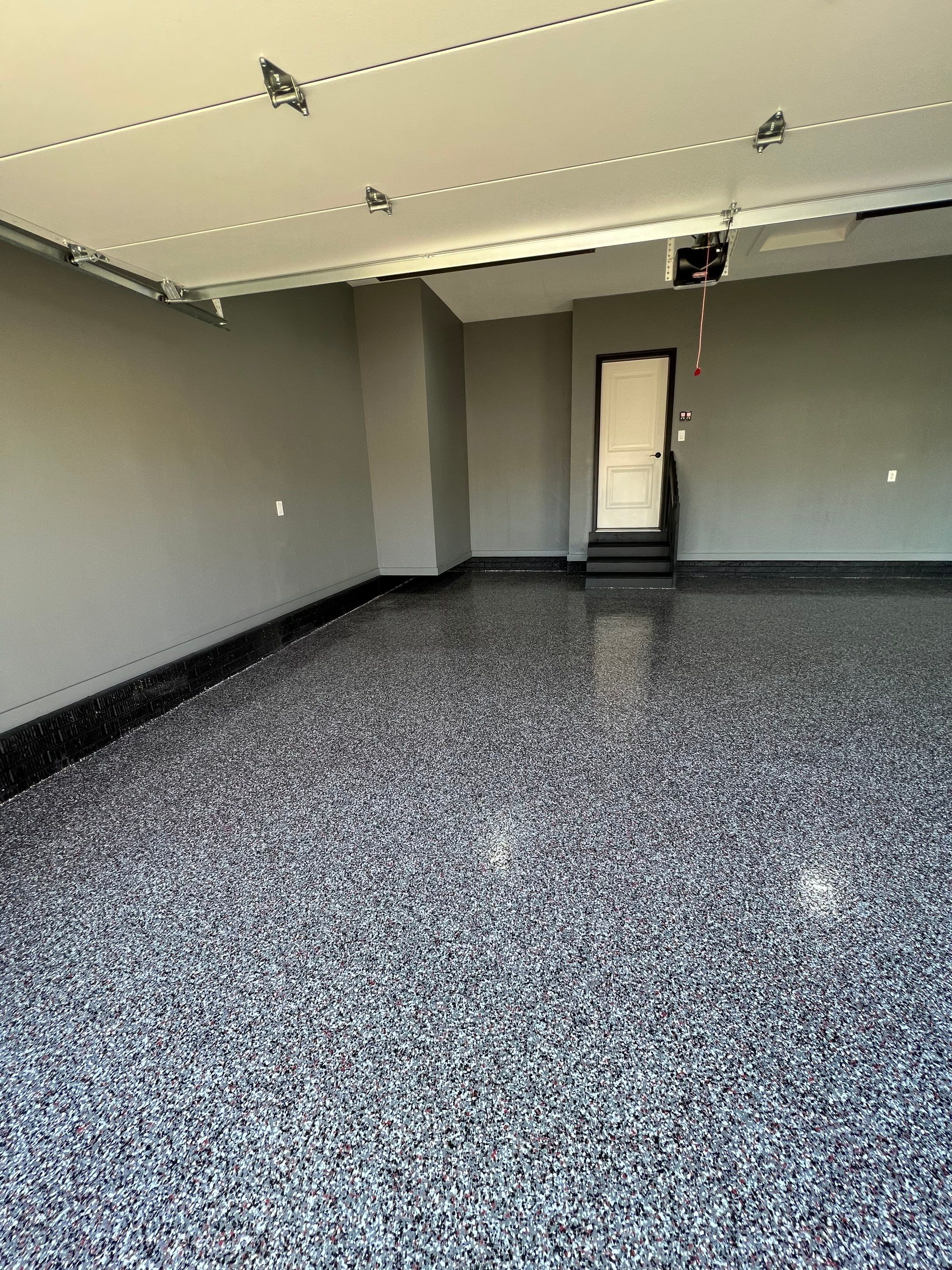 Garage painting and new floor by Cutting edge painting 