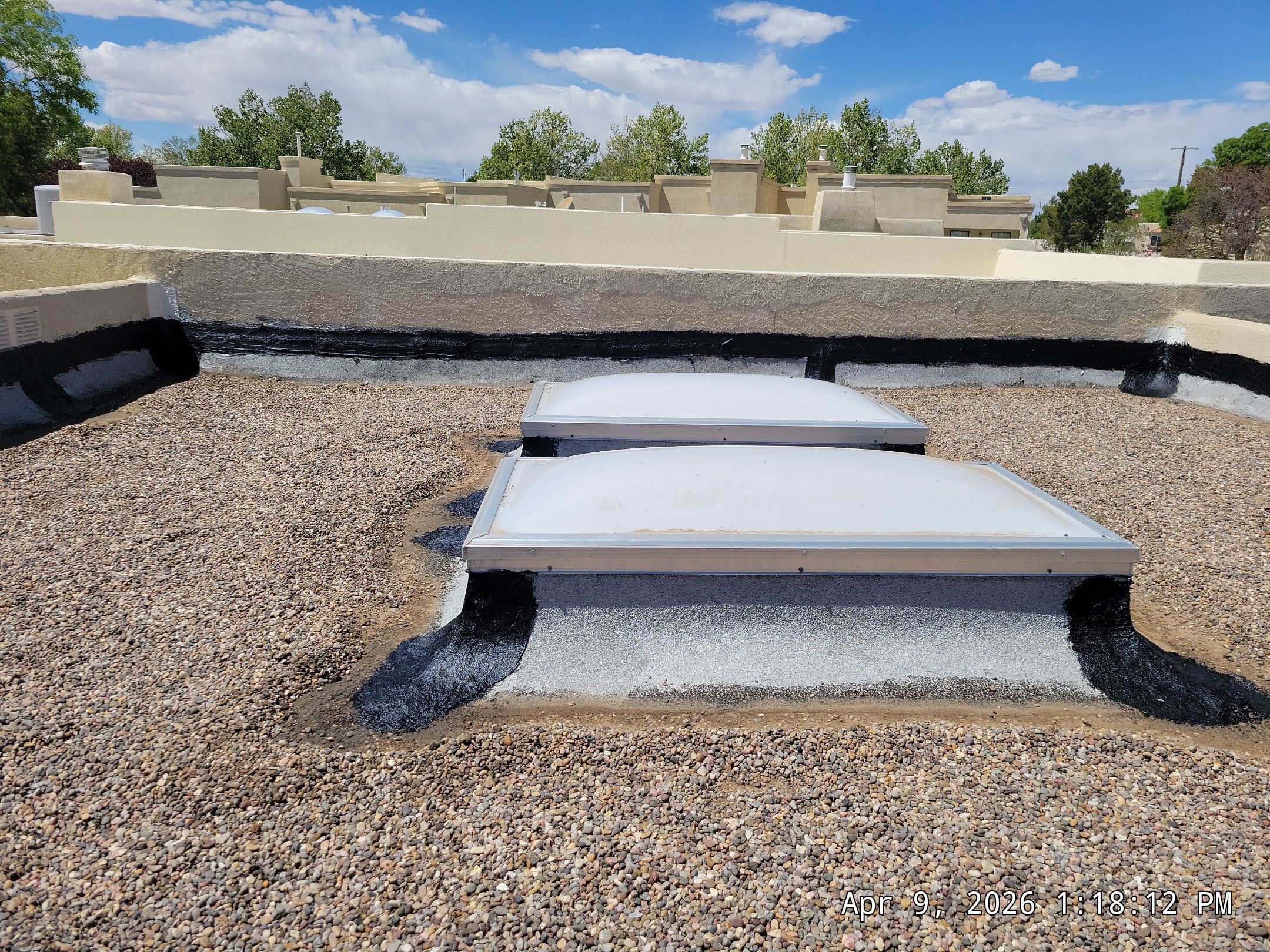 Tar and Gravel Roof Maintenance and Skylight Sealing in Rio Rancho by Doyle Roof Masters Inc