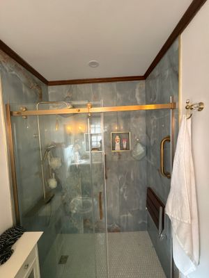 Modern Riverdale Bathroom Renovation Featuring Walk-In Marble Tile Shower
