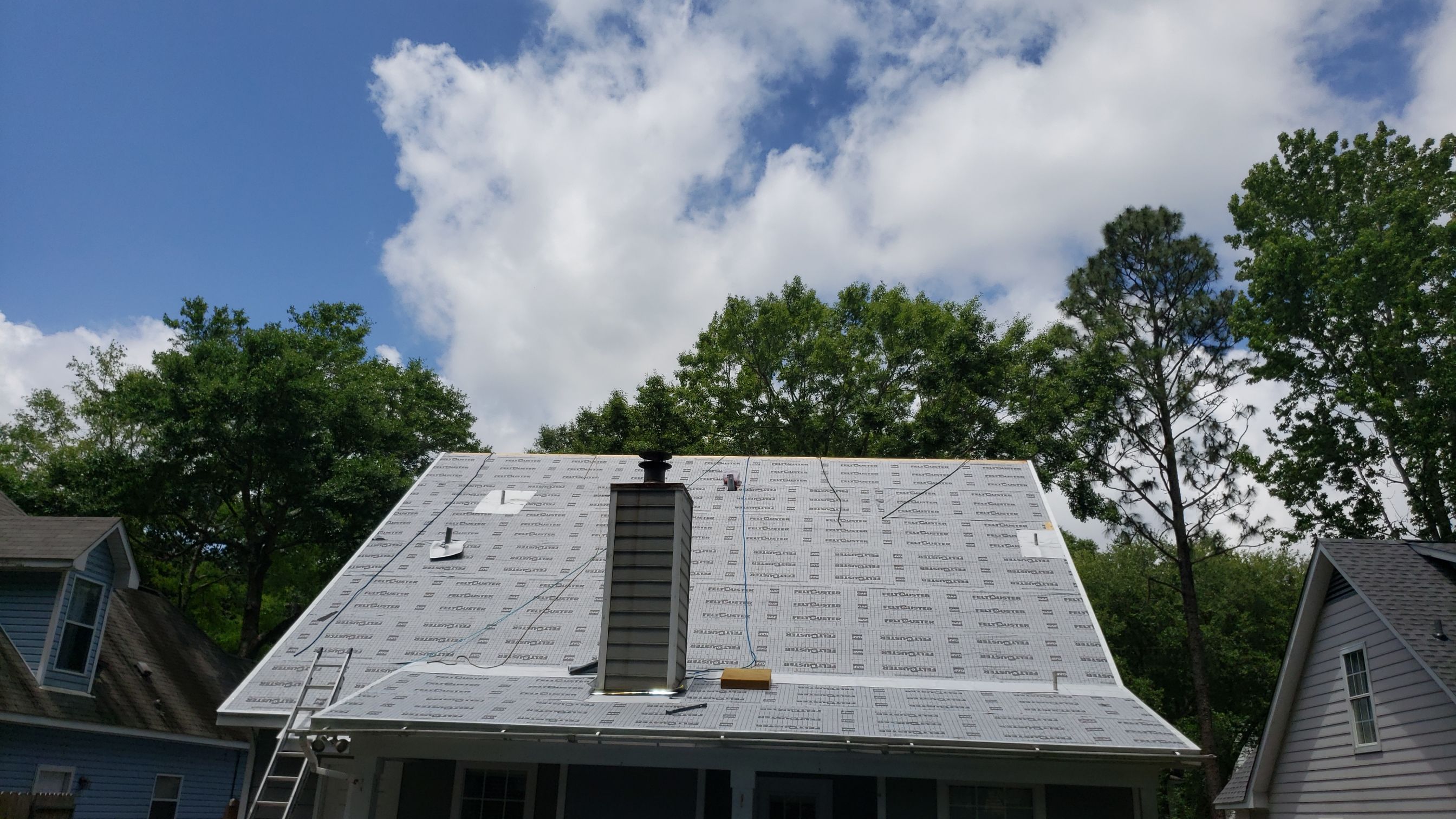 Residential Roofing Installation using Roof Replacement by American Roofing & Construction LLC
