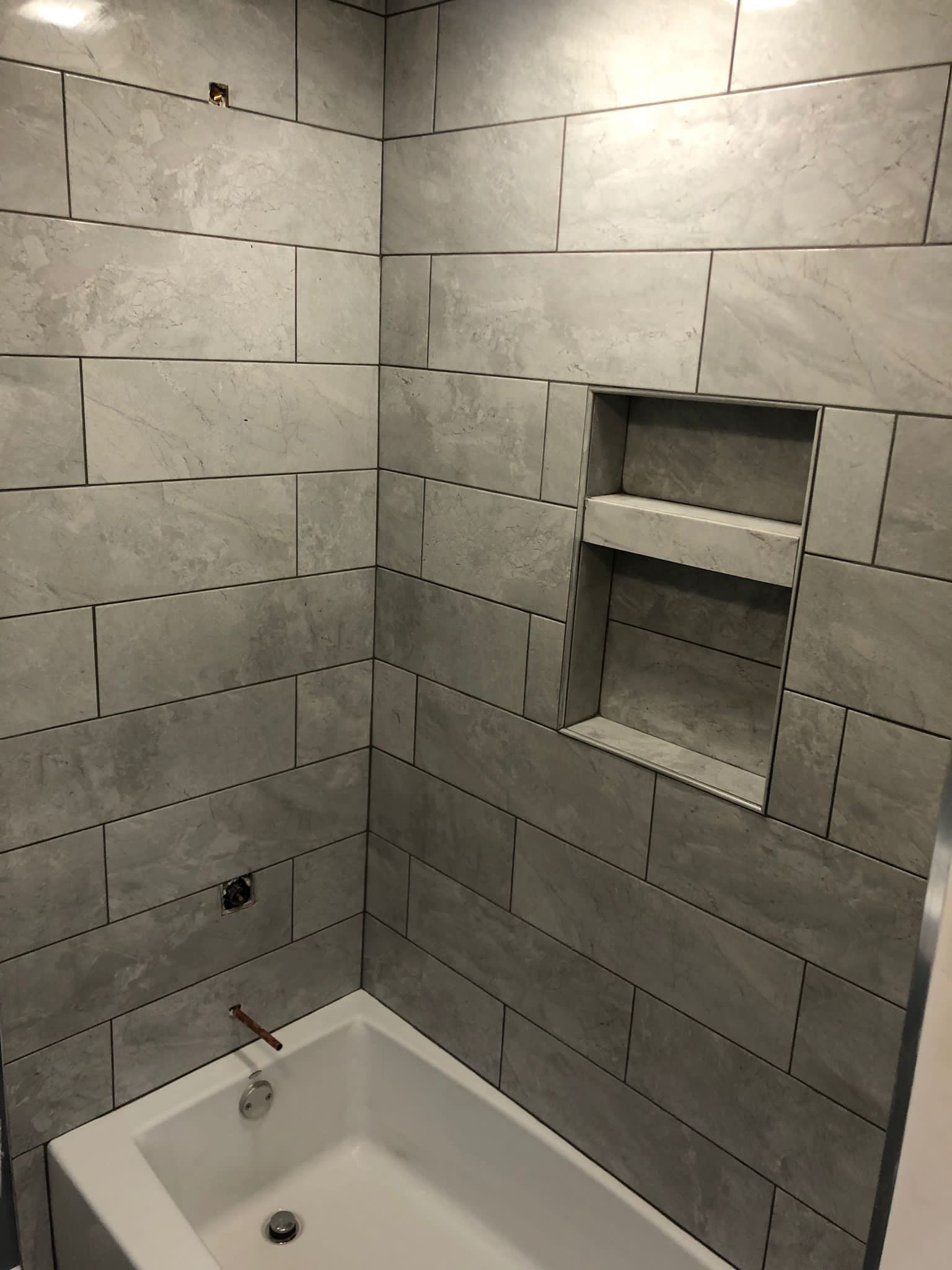 Bathroom Remodel using Tile by Home Concepts Construction
