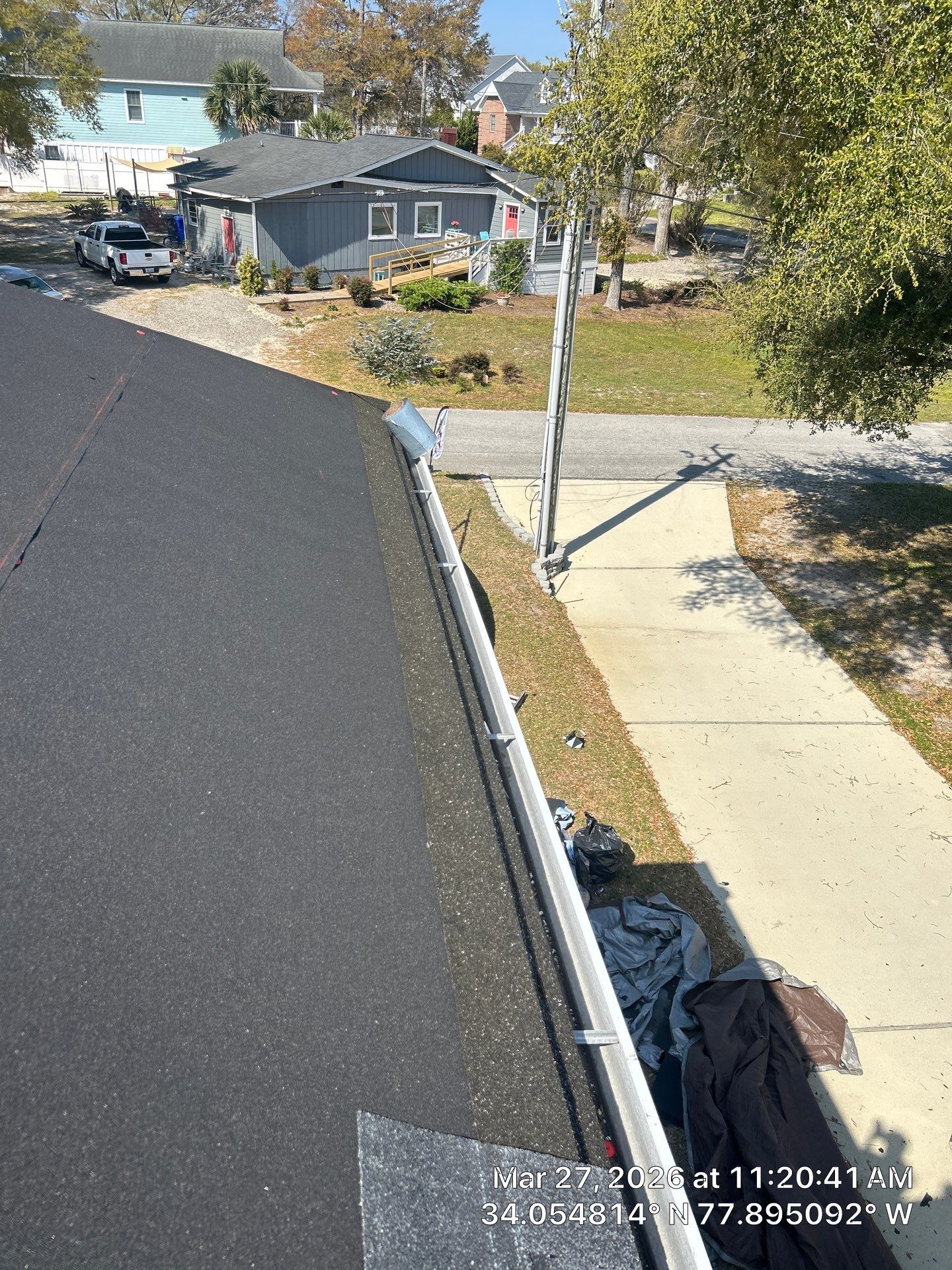 Roof Replacement (FORTIFIED Roof™ System) using CertainTeed Landmark Pro Shingles – Max Def Moire Black in Carolina Beach, NC by your trusted local roofing company near me by RGR Construction and Roofing, LLC