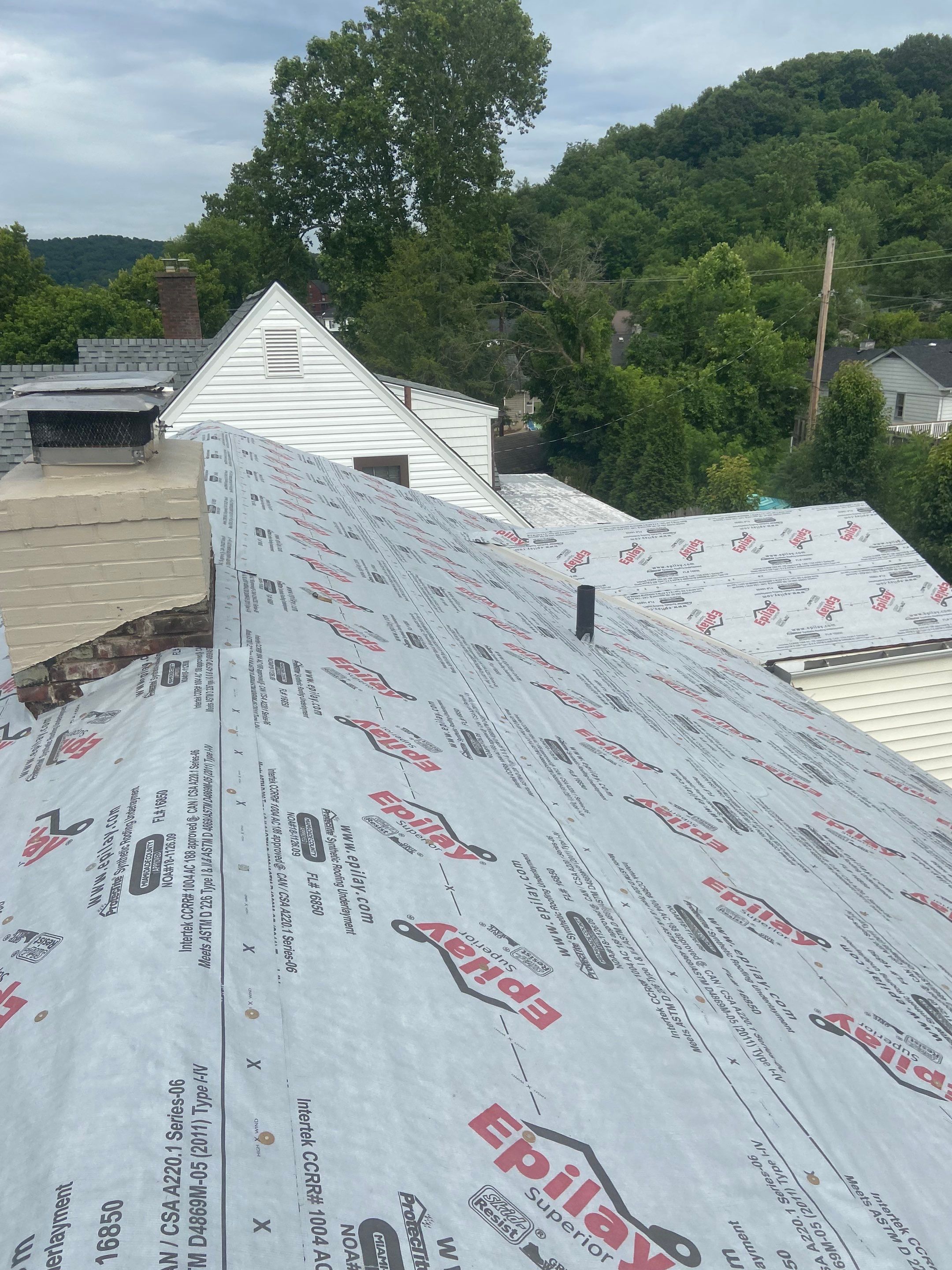 Metal Roofing, Skylights, Porch Build by Secure Construction Company Inc