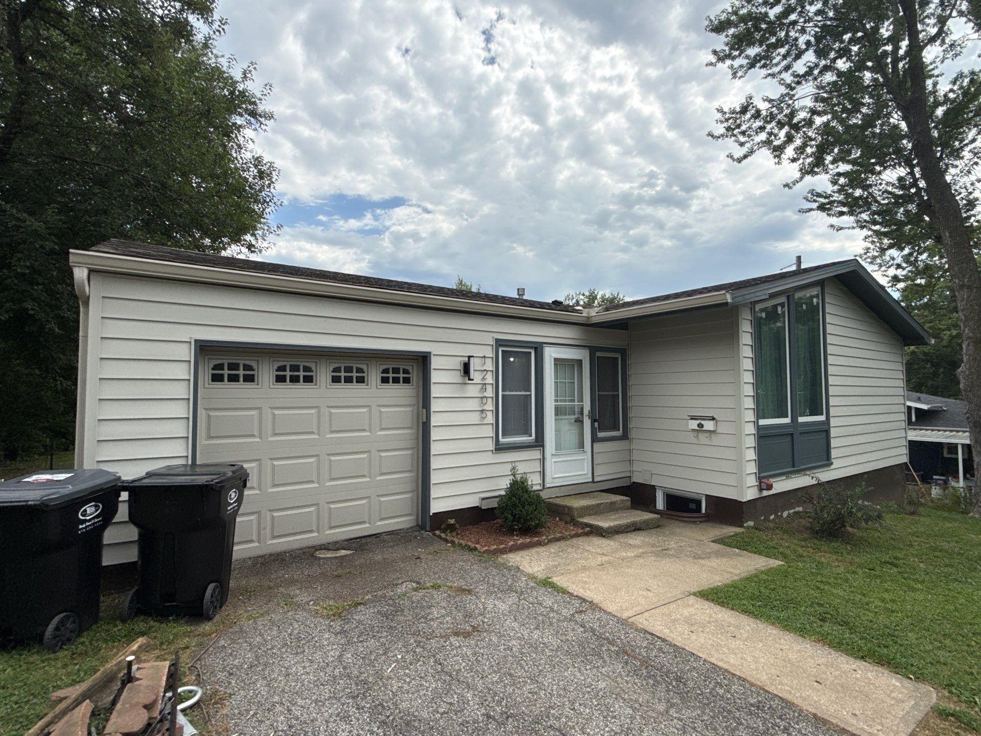Complete Exterior Transformation With Craneboard Siding and Heartland Windows by EEC Windows, Siding & Roofing