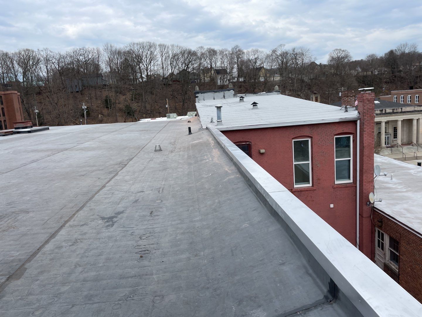Commercial Roofing Installation using EPDM  by A Plus Exterior