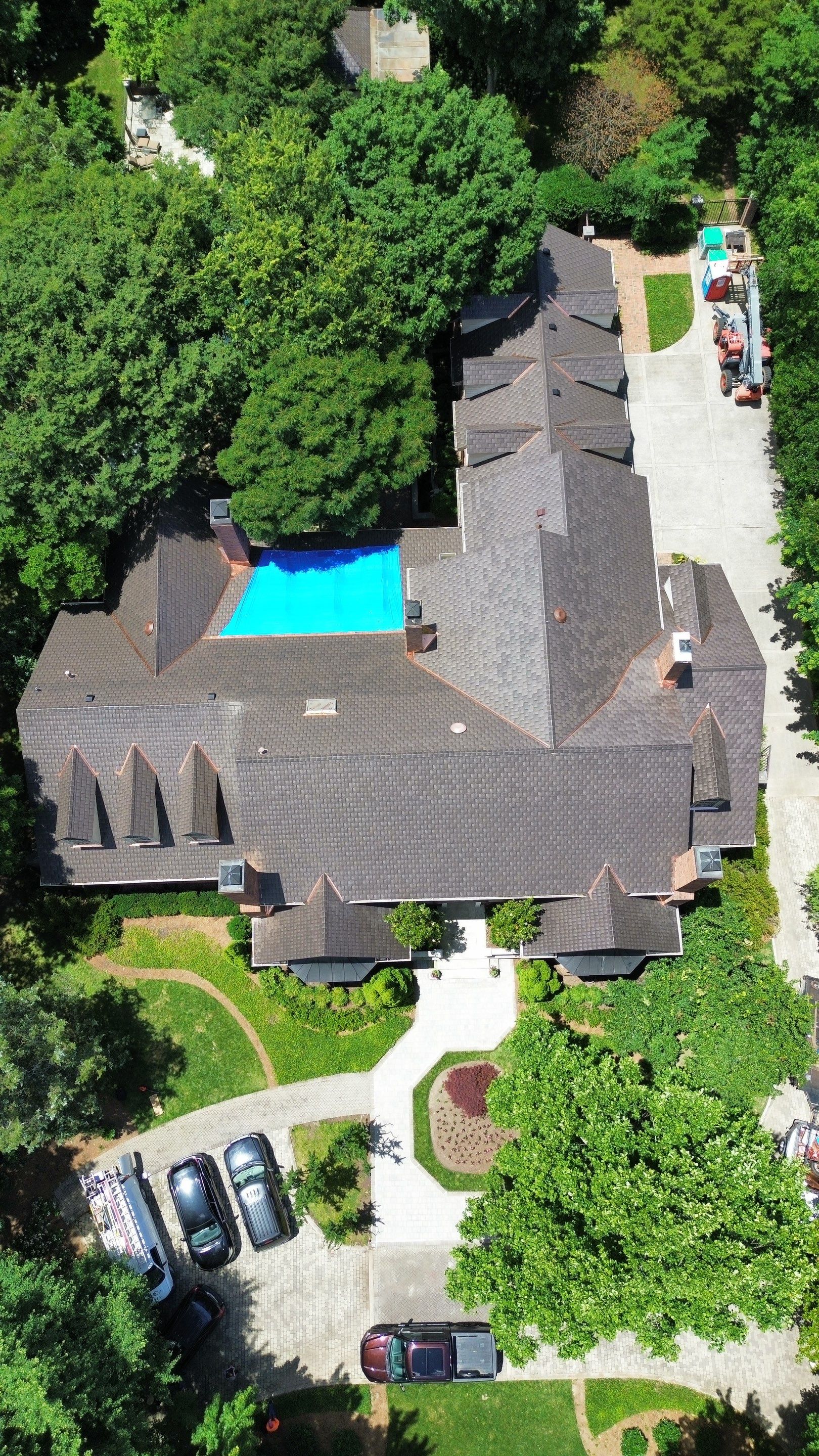 Residential Roofing Installation Using Enviroshake Synthetic Slate by Undersun Roofing 