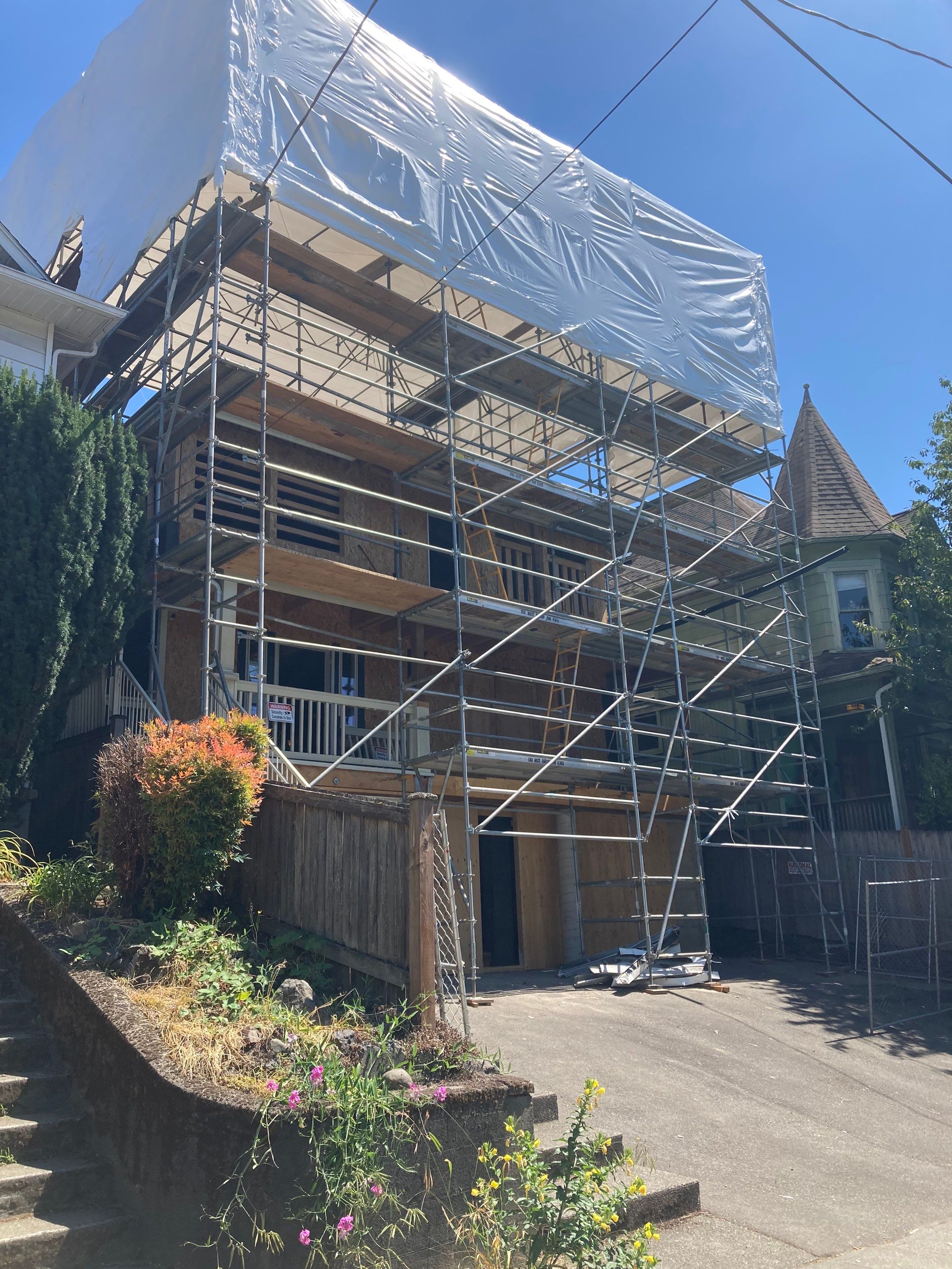 Roof tear-off and interior strip-out by Sledge Seattle