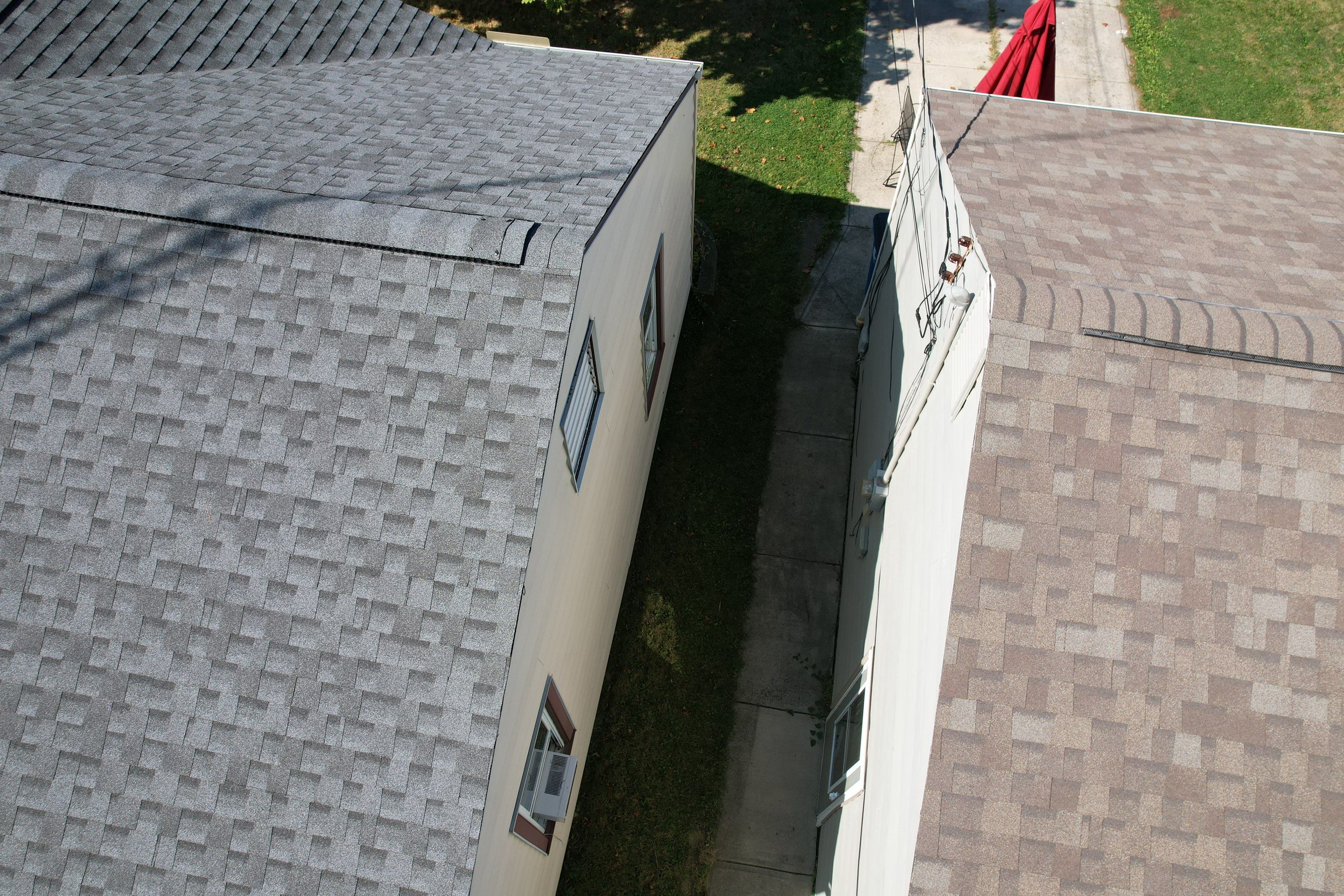 East Lake Roof & Garage  Replacement (With Gutters) by Atlas Roofing & Restoration