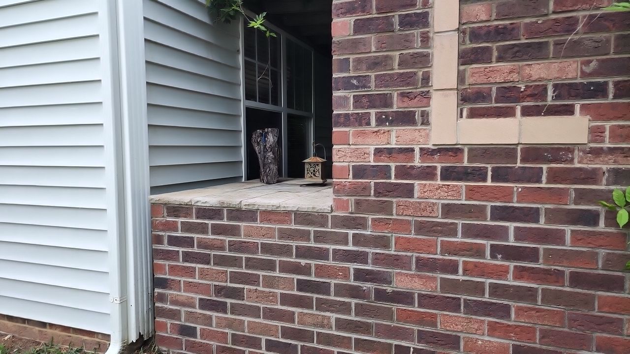 House Wash using cleaner by Power Wash Masters LLC