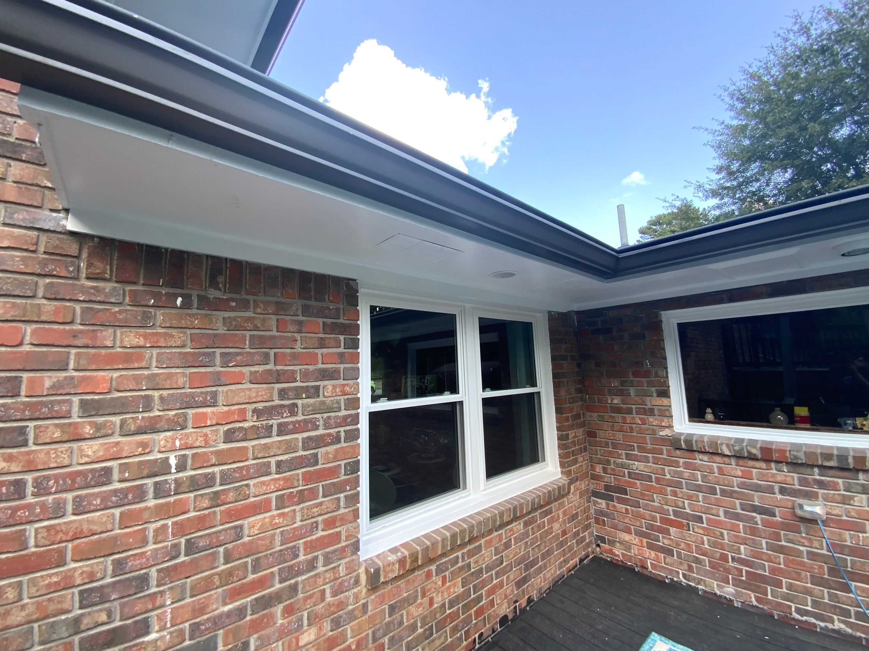 Full Exterior Trim Painting and Multi-Level Deck Staining by Swift Home Renovations