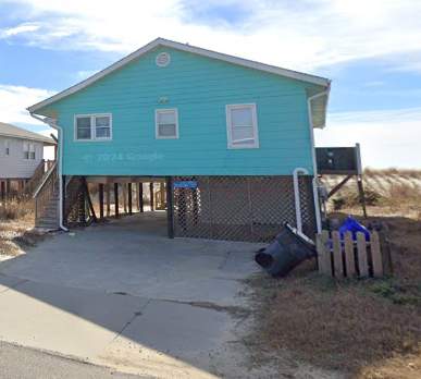 New Vinyl Window Installation for Elevated Beachfront Home in Oak Island by RGR Construction and Roofing, LLC