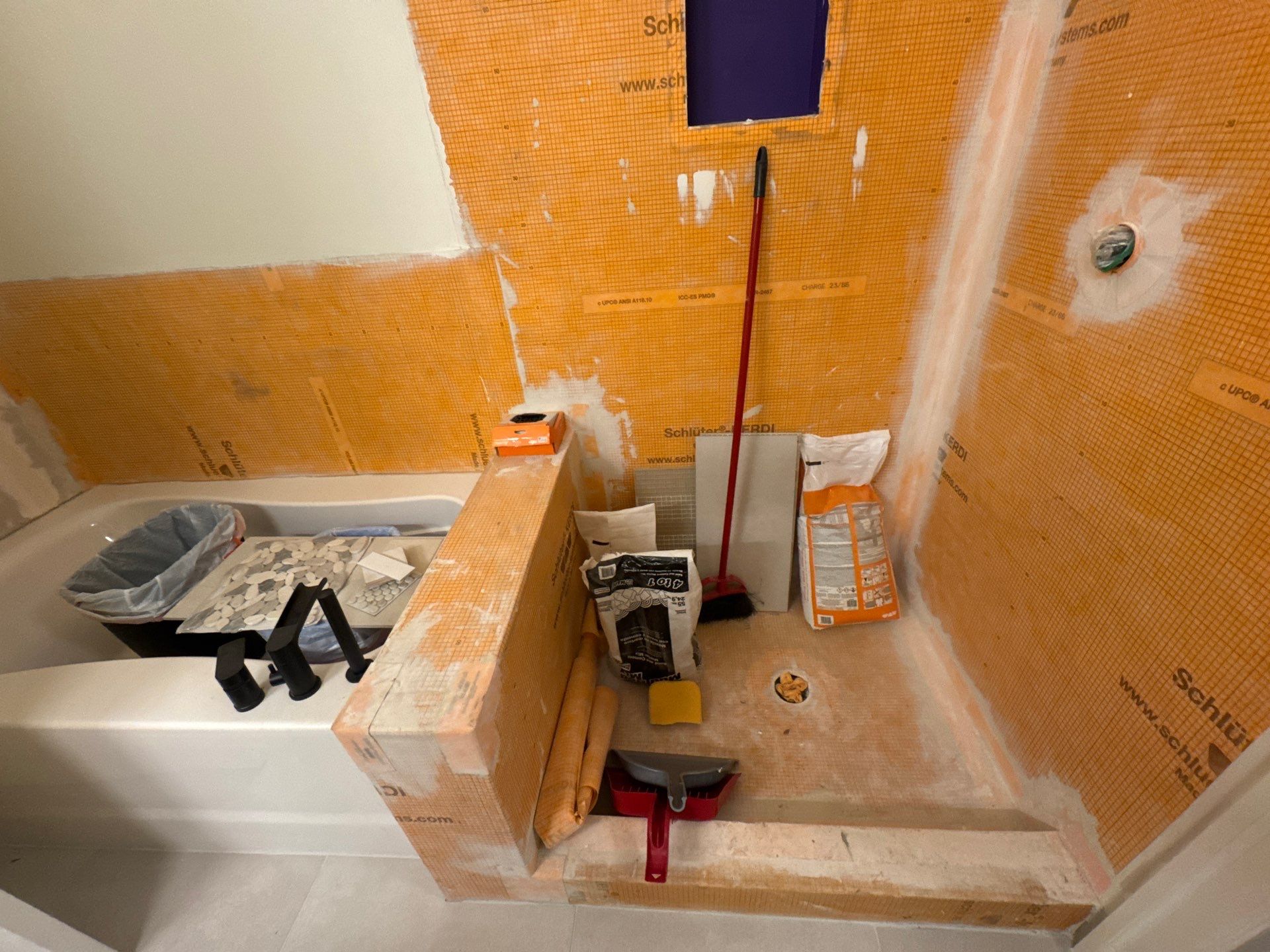 Shower and tub tiling  by Prudencio