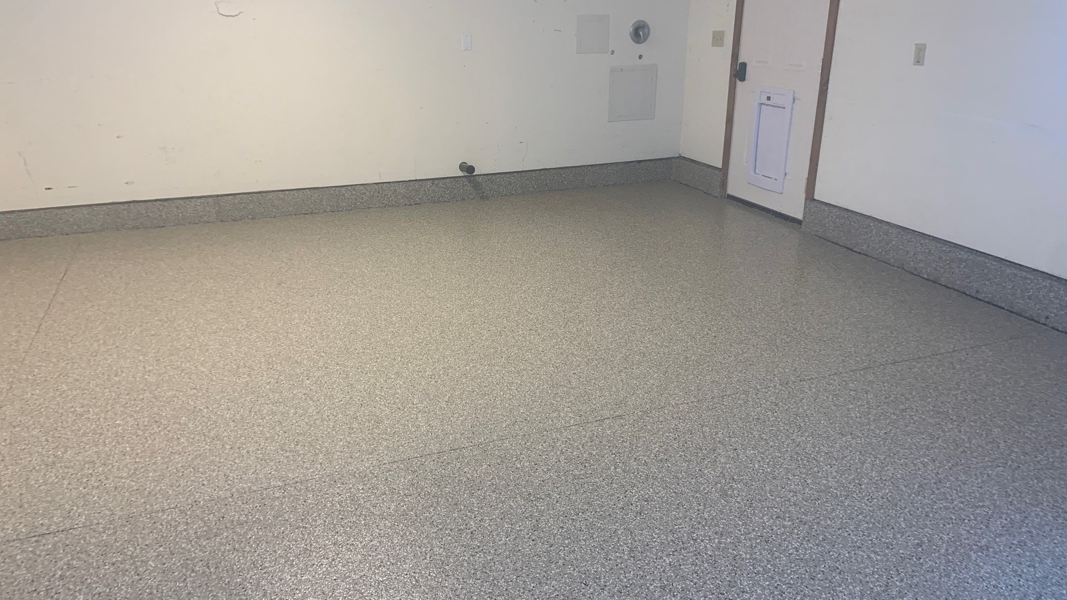 Garage Transformation using Pebble Beach by Croc Coatings, LLC