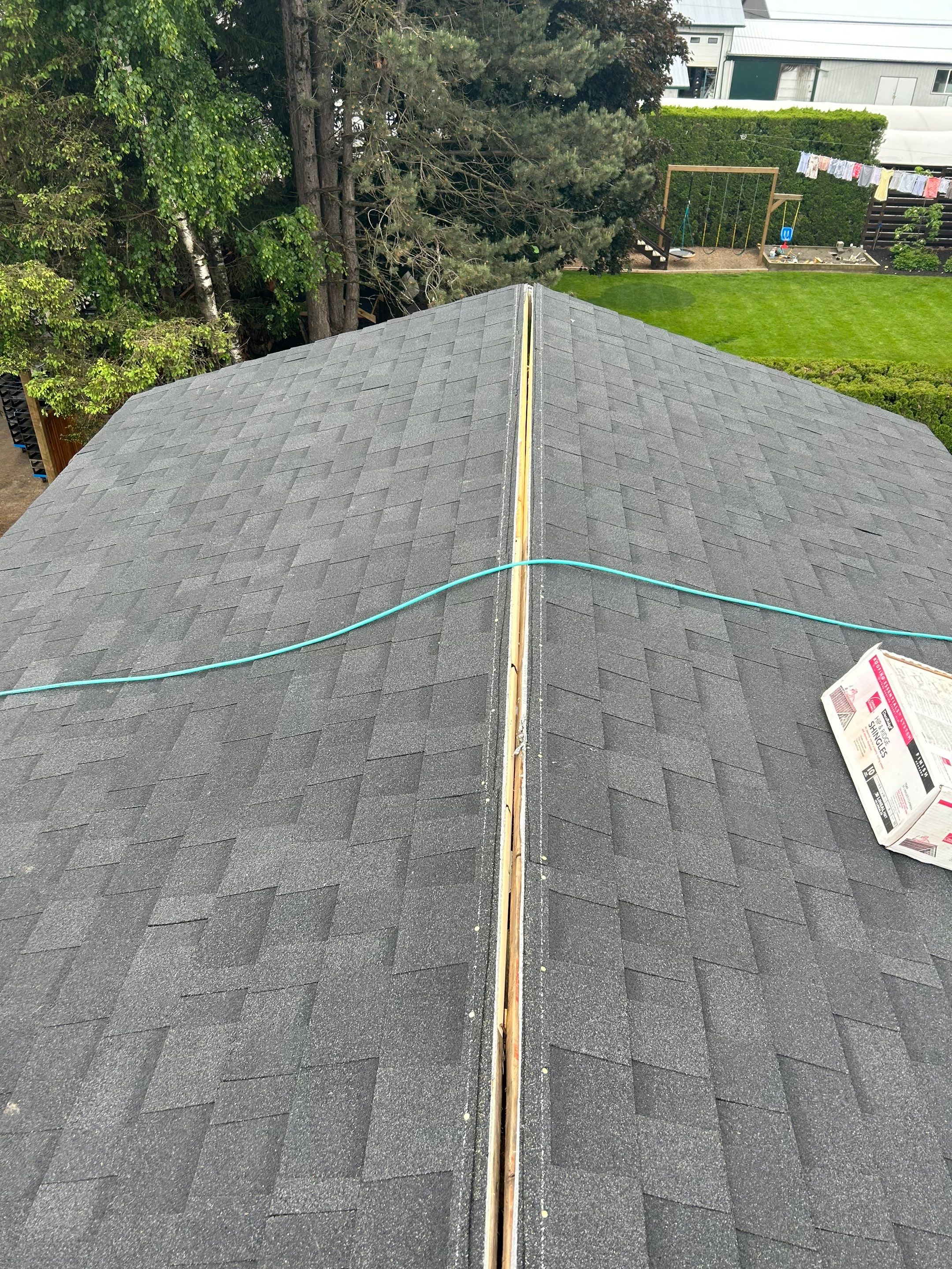 Residential Roofing Installation using OC Oakridge shingles by Top Notch Roofing Inc