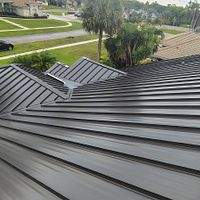 24ga 1.5" Mechanical Seam Dark Bronze by Total Roofing System The Metal Roof Experts