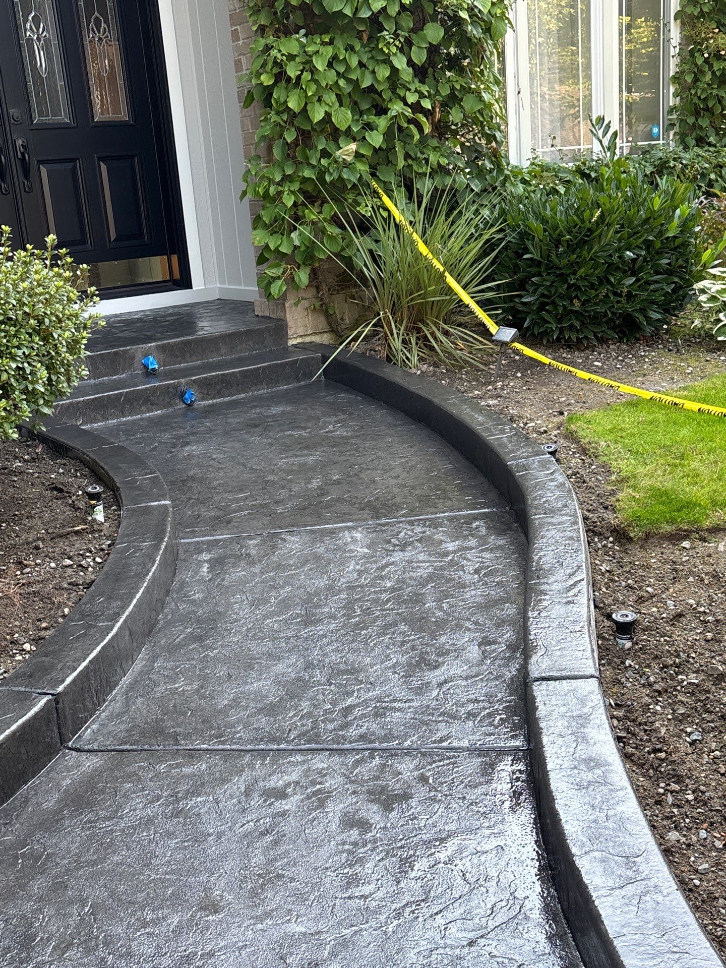 Multi-color Stamped & Sealed Concrete Driveway Renovation | Mukilteo by Jireh Asphalt & Concrete Inc